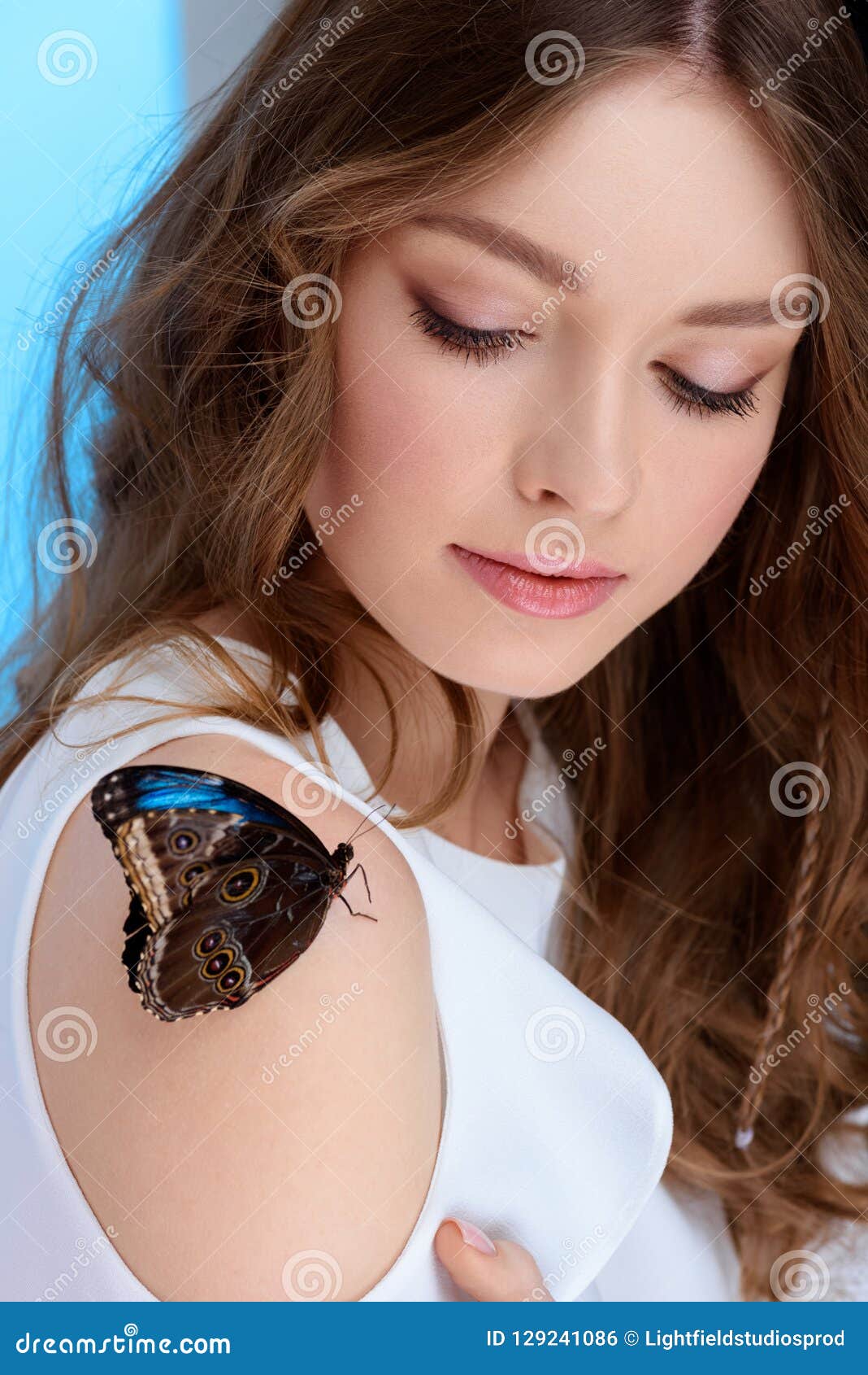 sensual young woman with butterfly