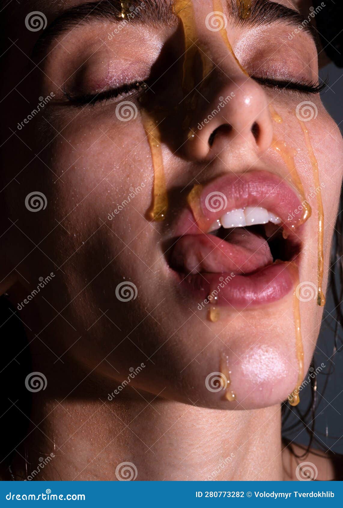 Sensual Young Woman Face with Honey Drop Close Up. Beautiful Girl Tongue  Licking Honey Lips Stock Photo - Image of antiaging, headshot: 280773282