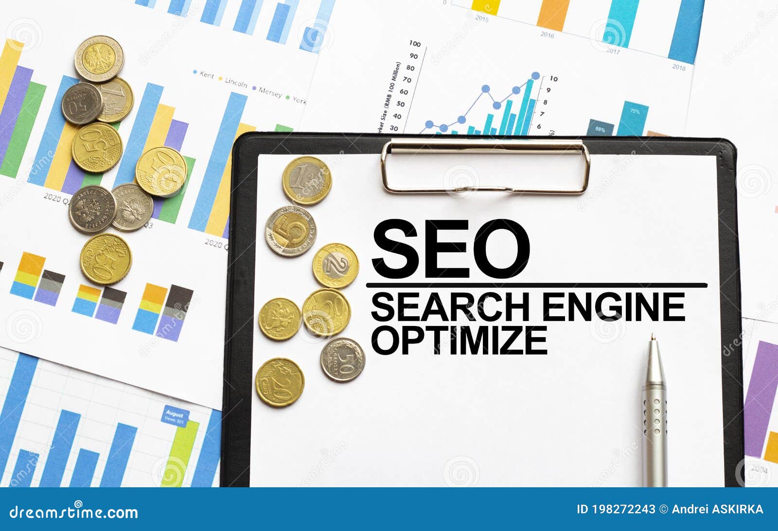 seo serach engine optimize text acronym word throgh magnifying glass lens on office desk table. business kpi concept