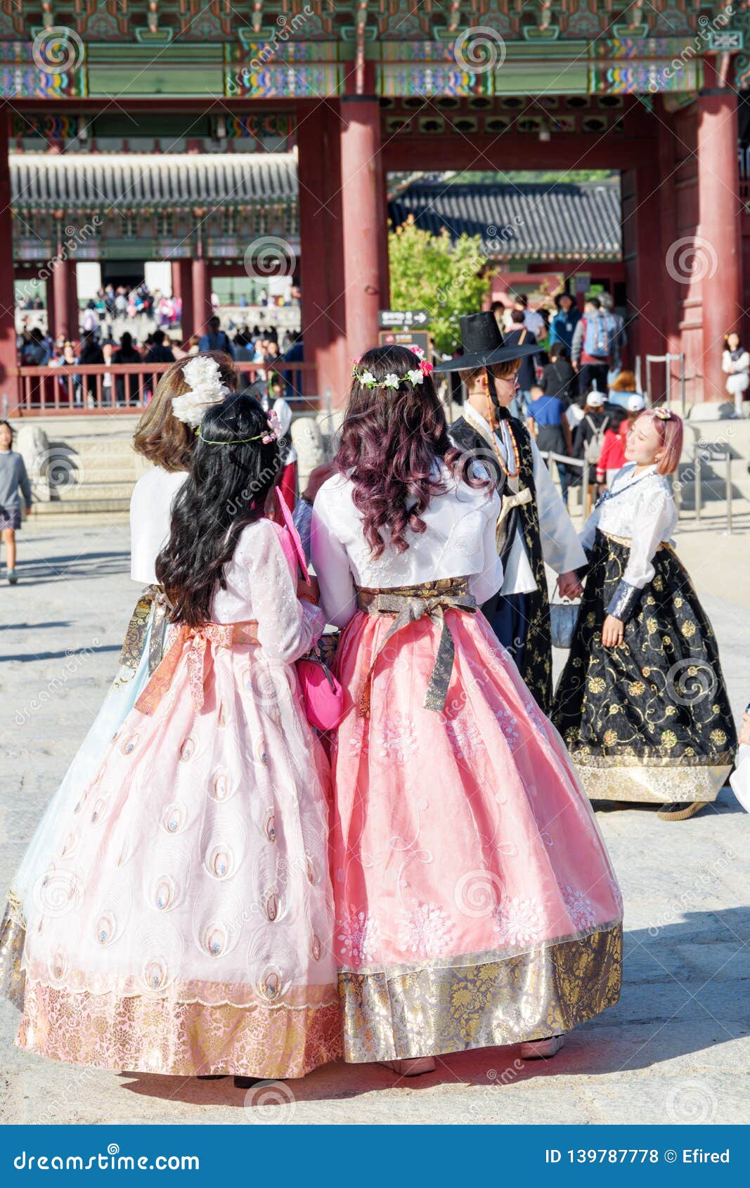 Pretty Korean girls wearing traditional Hanbok dress in Seoul