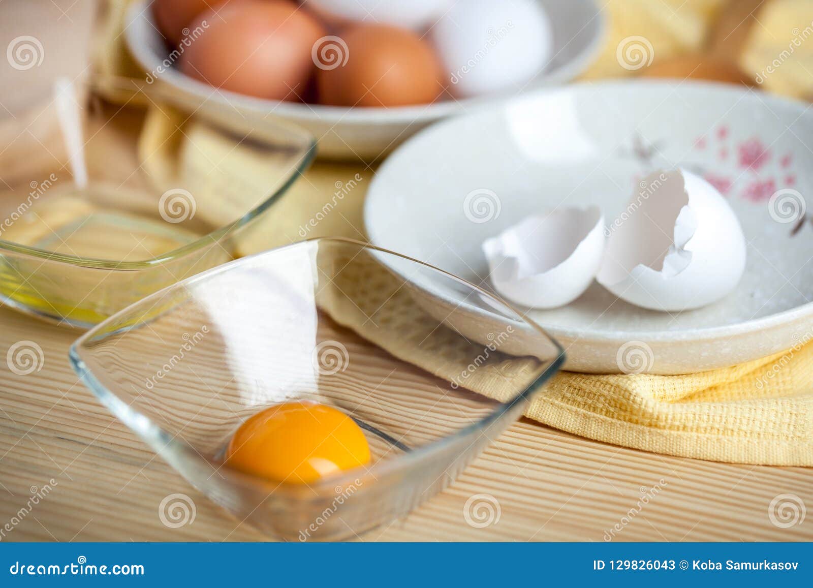 Separate The Egg Yolks From The Egg Whites Prepared For Making Cakes