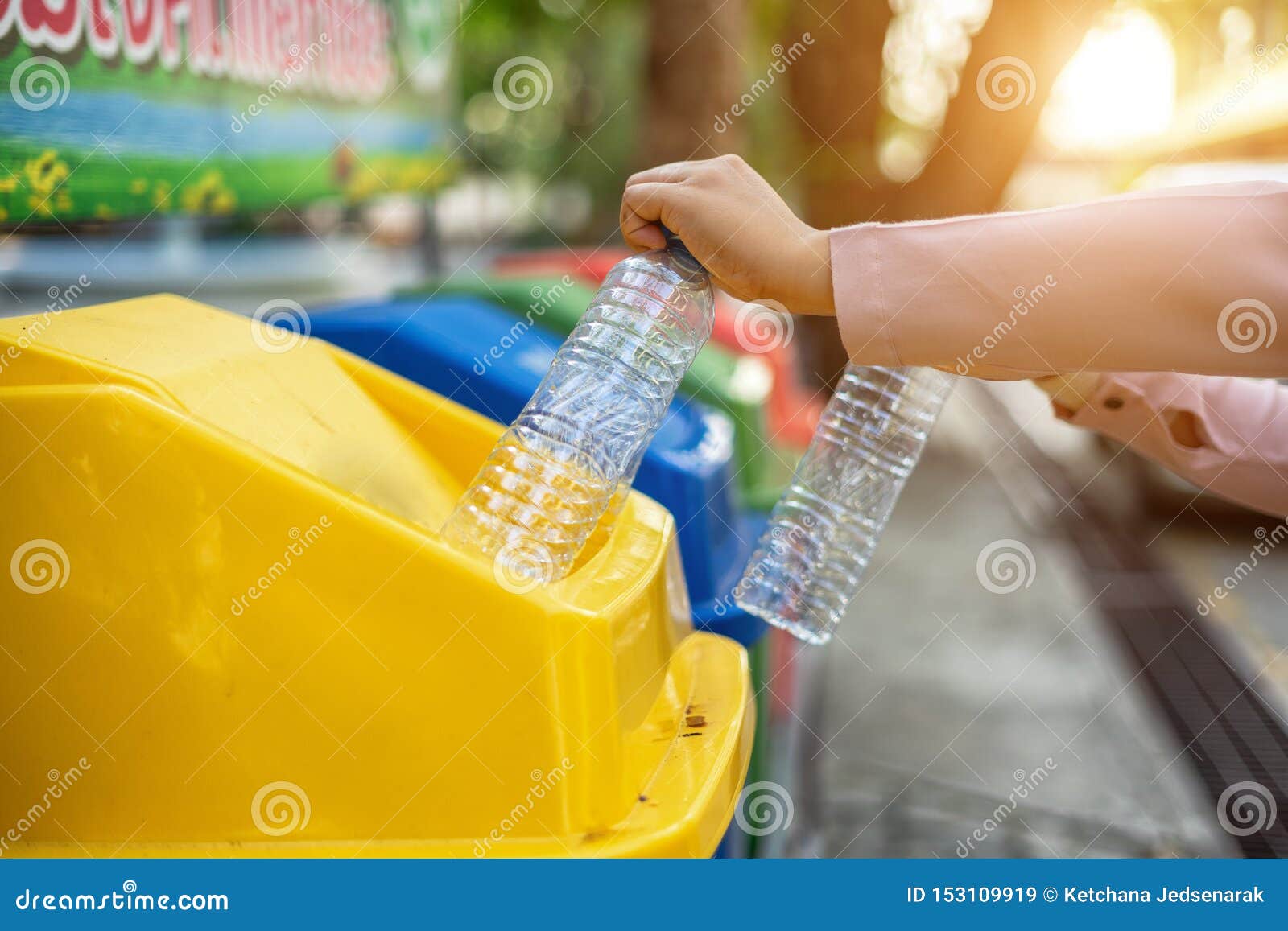 Separating Waste Plastic Bottles into Recycling Bins is To Protect the