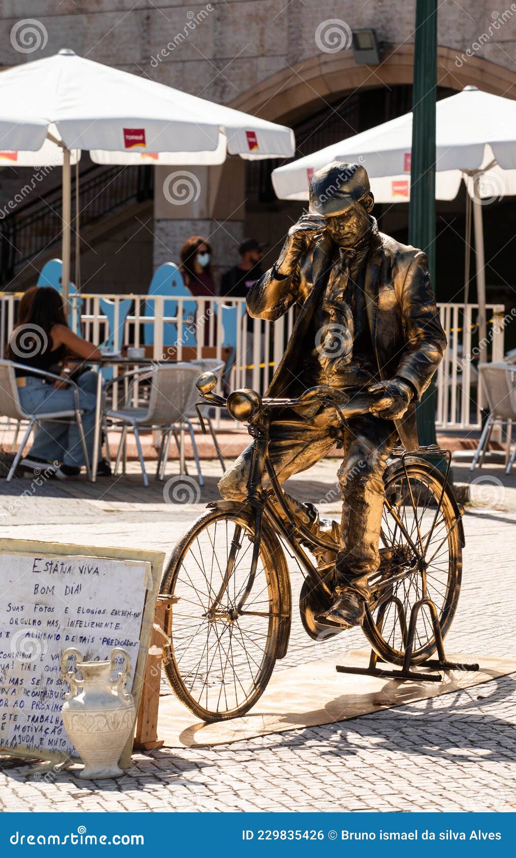 11 September 2021, a Living Sculpture Vintage Cyclist Performing in the  Street, Aveiro. Editorial Photo - Image of city, bronze: 229835426