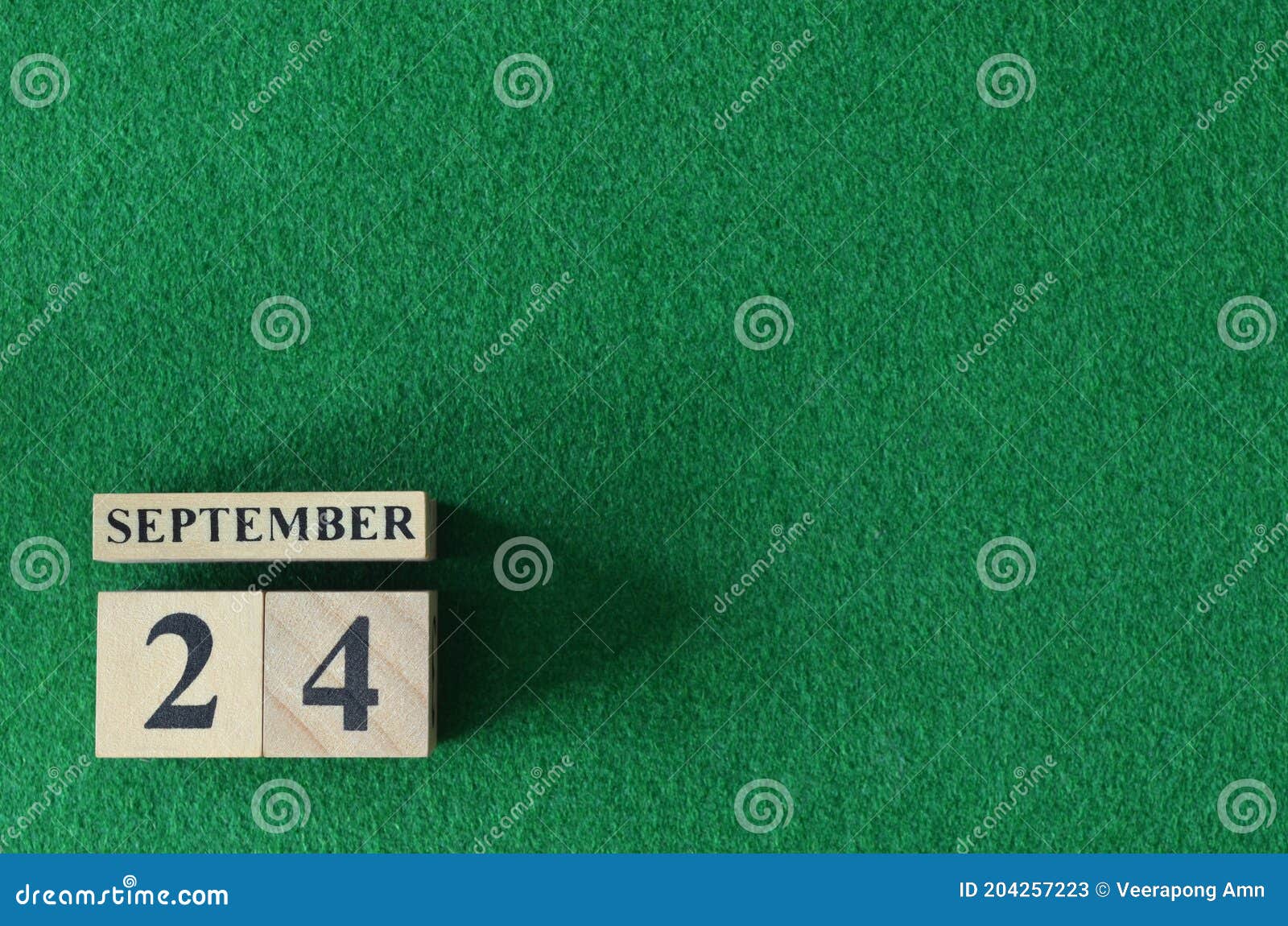 september 24, number cube on snooker table, sport background.