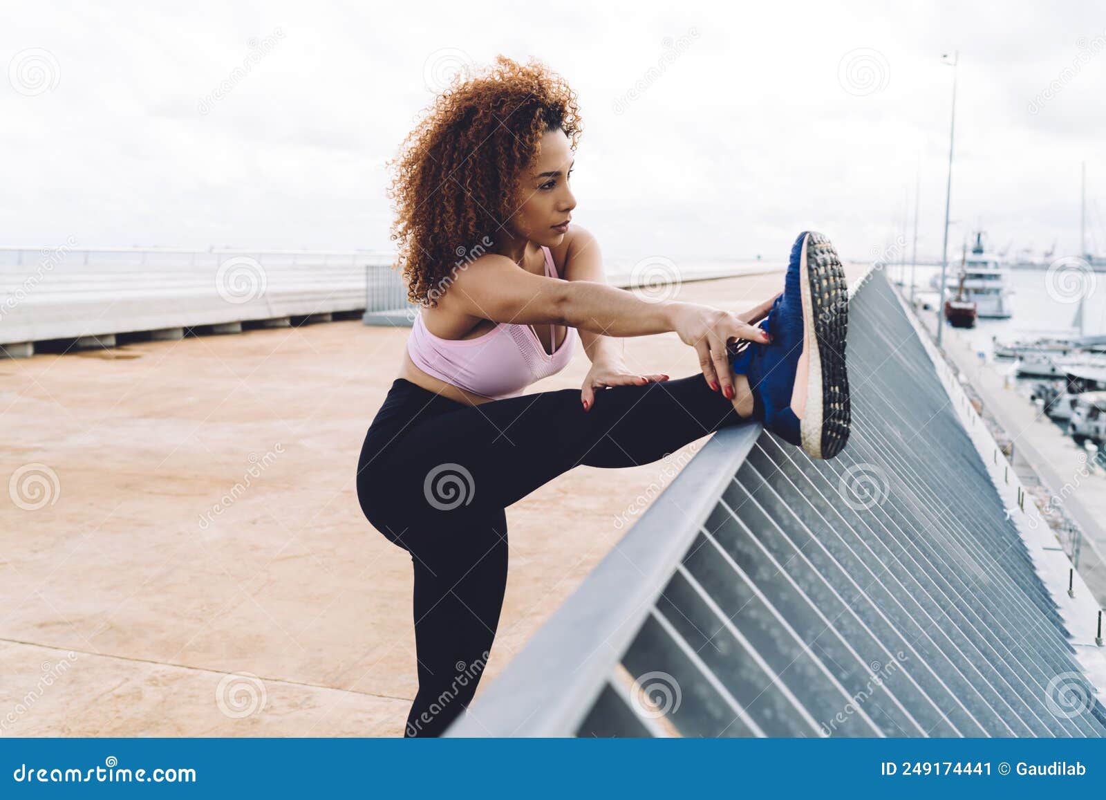 Serious Beautiful Female in Sportswear Doing Exercise Outdoors Reaching Fitness  Goals Stock Image - Image of flexibility, physical: 249174441