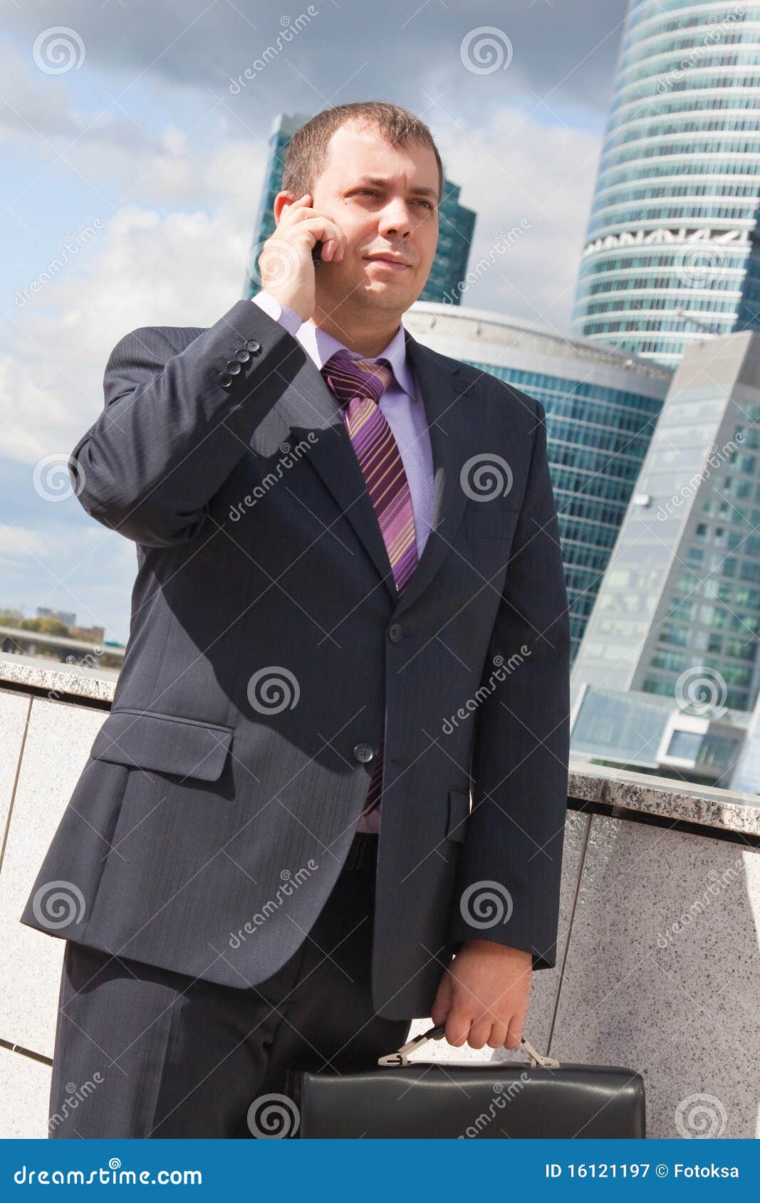 Serious Businessman with Briefcase and Phone Stock Image Image of