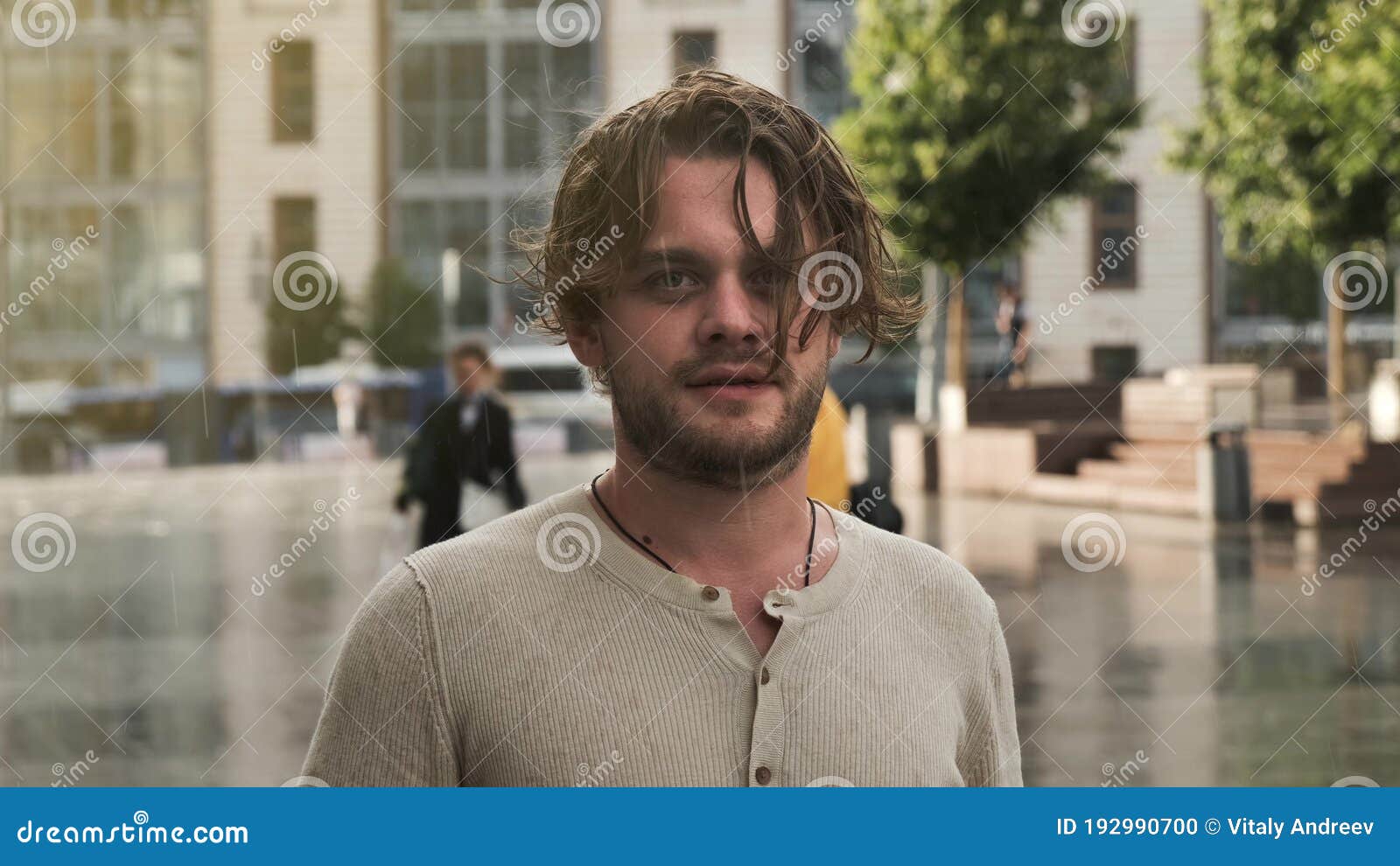 Serious Guy with Long Wet Blond Hair Got Caught in Rain and is Looking at  Camera. Displeased Young Man Portrait Outdoors Stock Photo - Image of  cheerful, happy: 192990700