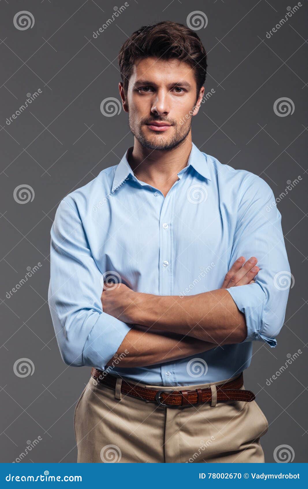 Serious Handsome Man with Arms Folded Standing Stock Photo - Image of ...