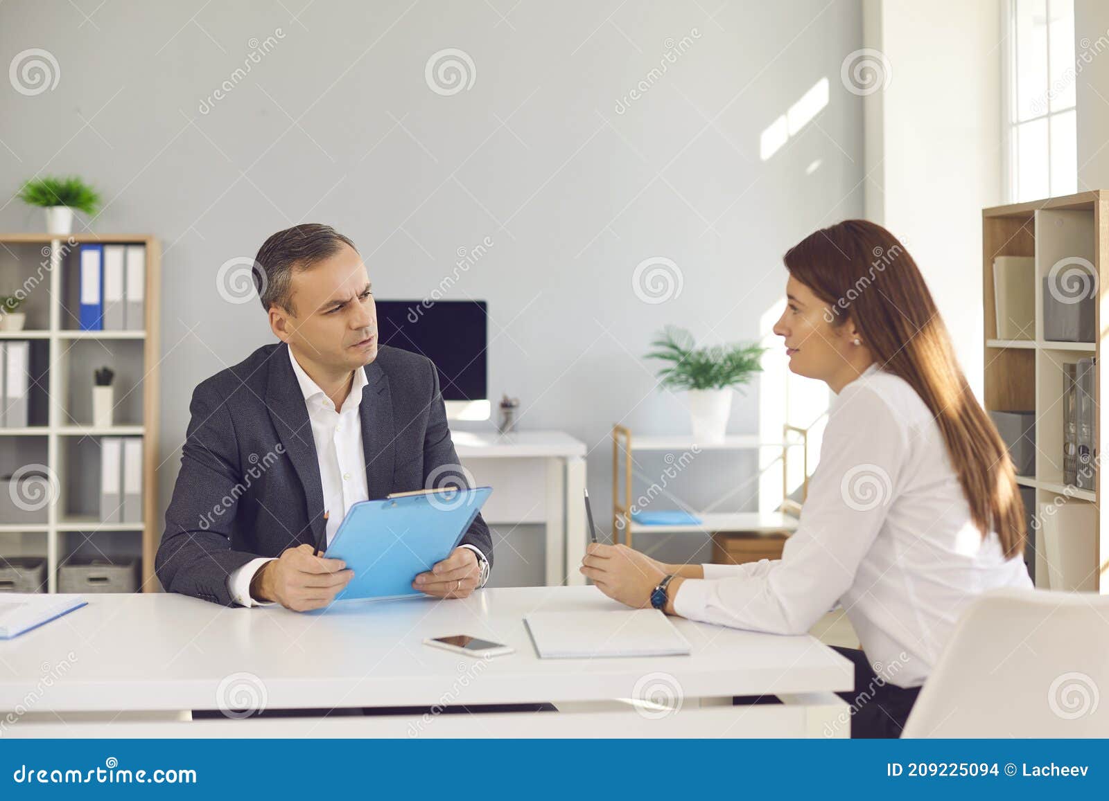 Serious HR Manager Listening To Candidate Telling about Her Work Experience  during Job Interview Stock Photo - Image of employment, advisor: 209225094