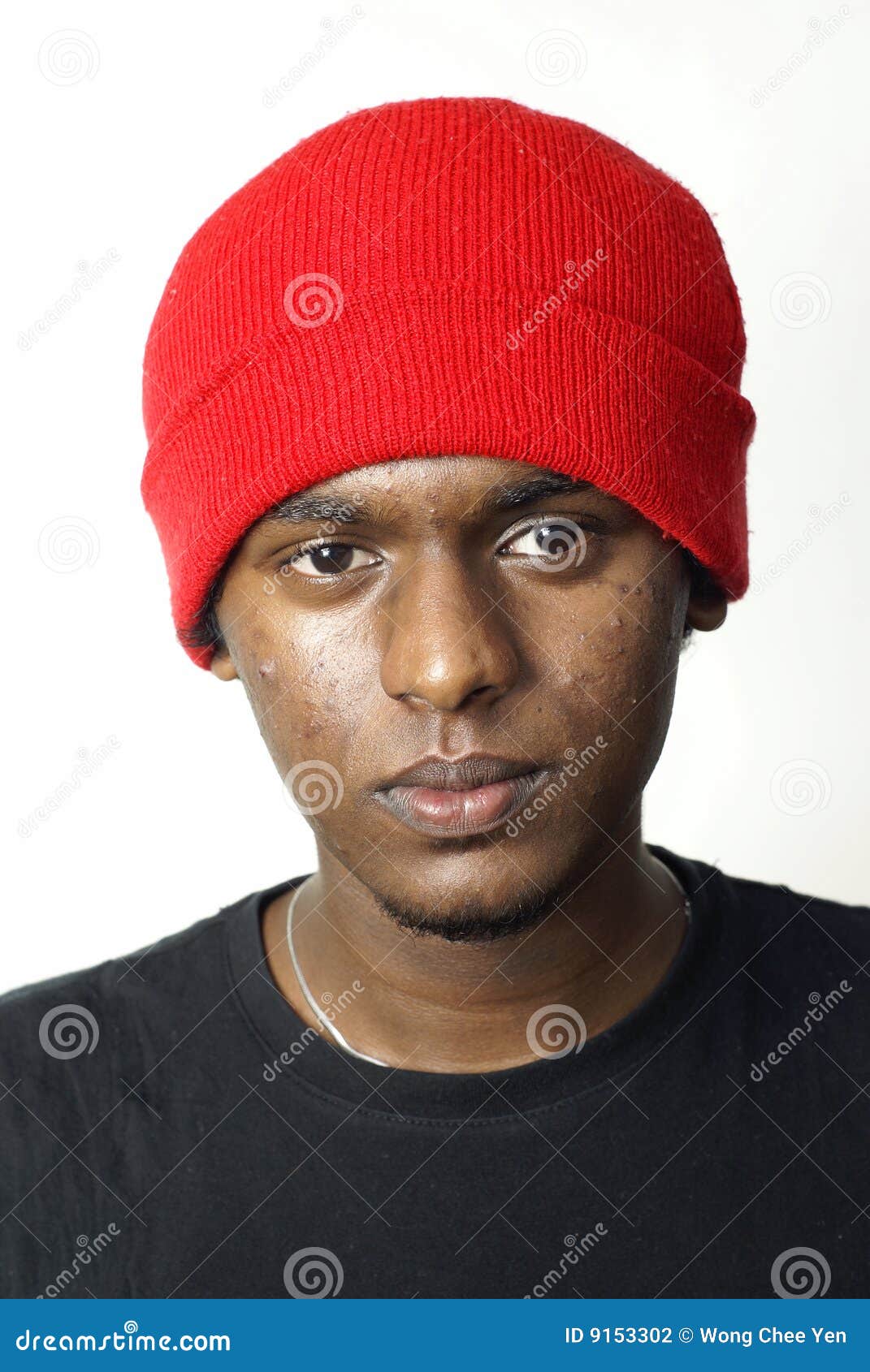 Attractive Young Woman In Glasses And Knitted Cap. Red Lipstick