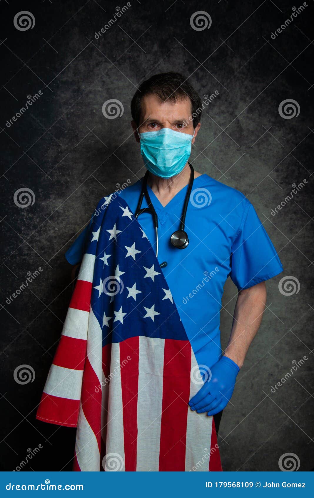 Doctor Wearing Surgical Mask Holding the American Flag. Stock Image ...