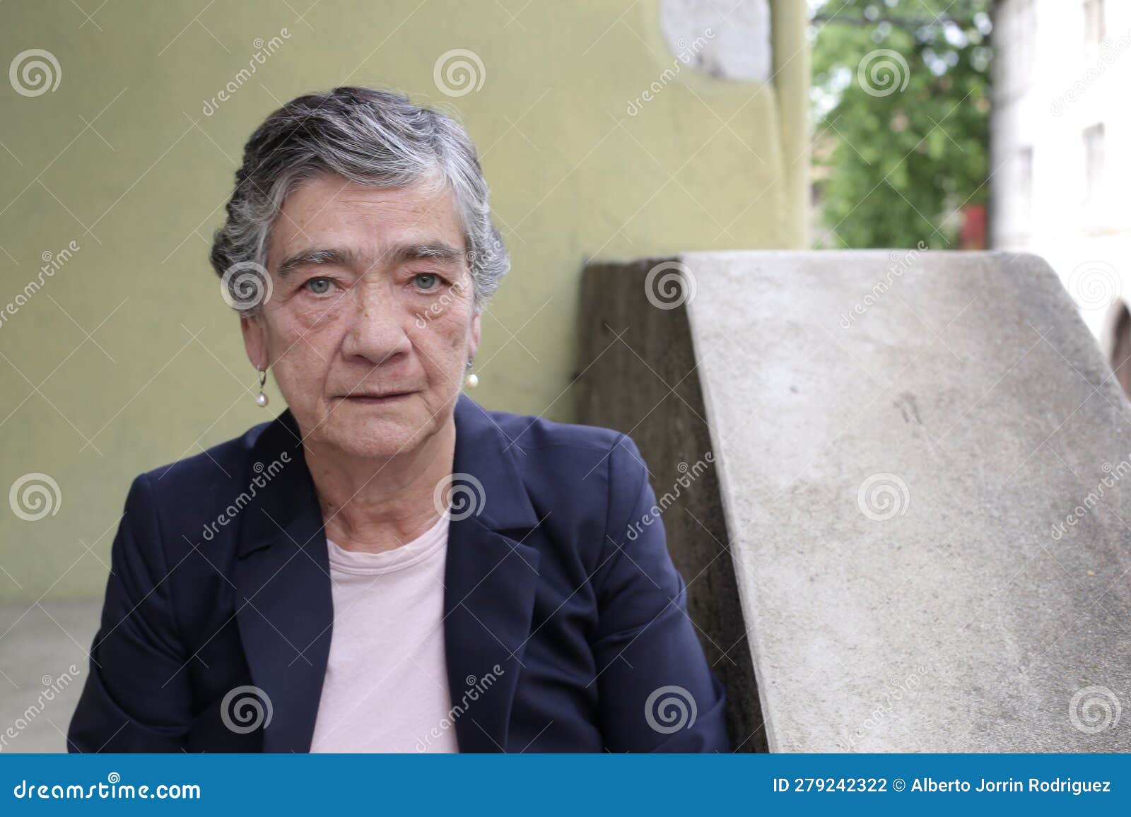 Serious Looking Senior Woman with Short Gray Hairstyle Stock Photo