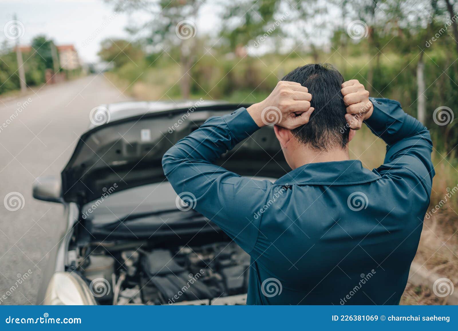 Serious Man Headache Front of Car Breakdown and Open on Roadside