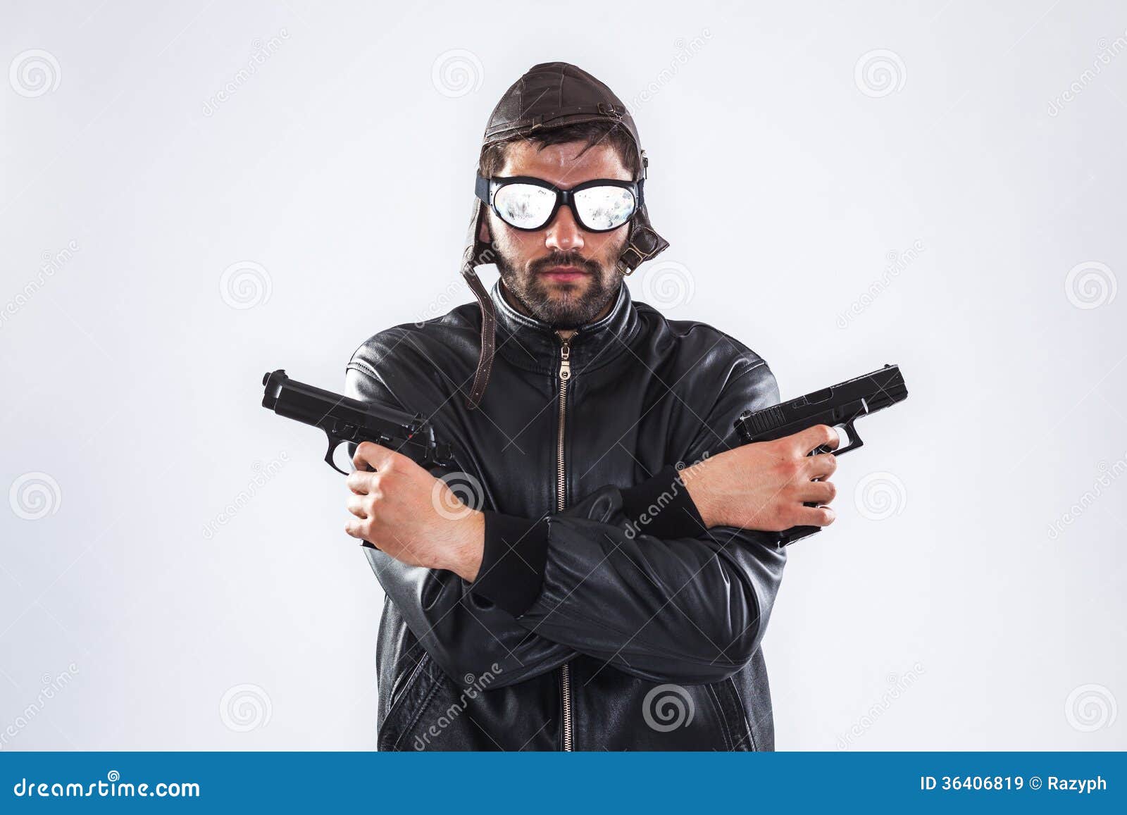 Serious Man Holding Two Guns In His Hands Royalty Free Stock Images