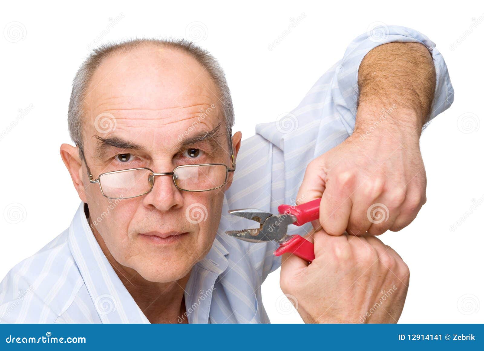 Serious man with pliers stock image. Image of close, equipment 12914141