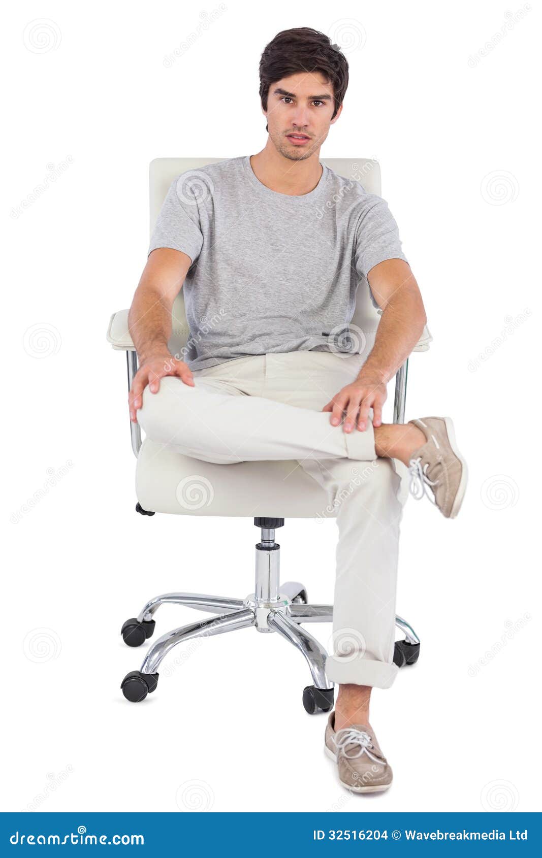 serious man sitting on a swivel chair