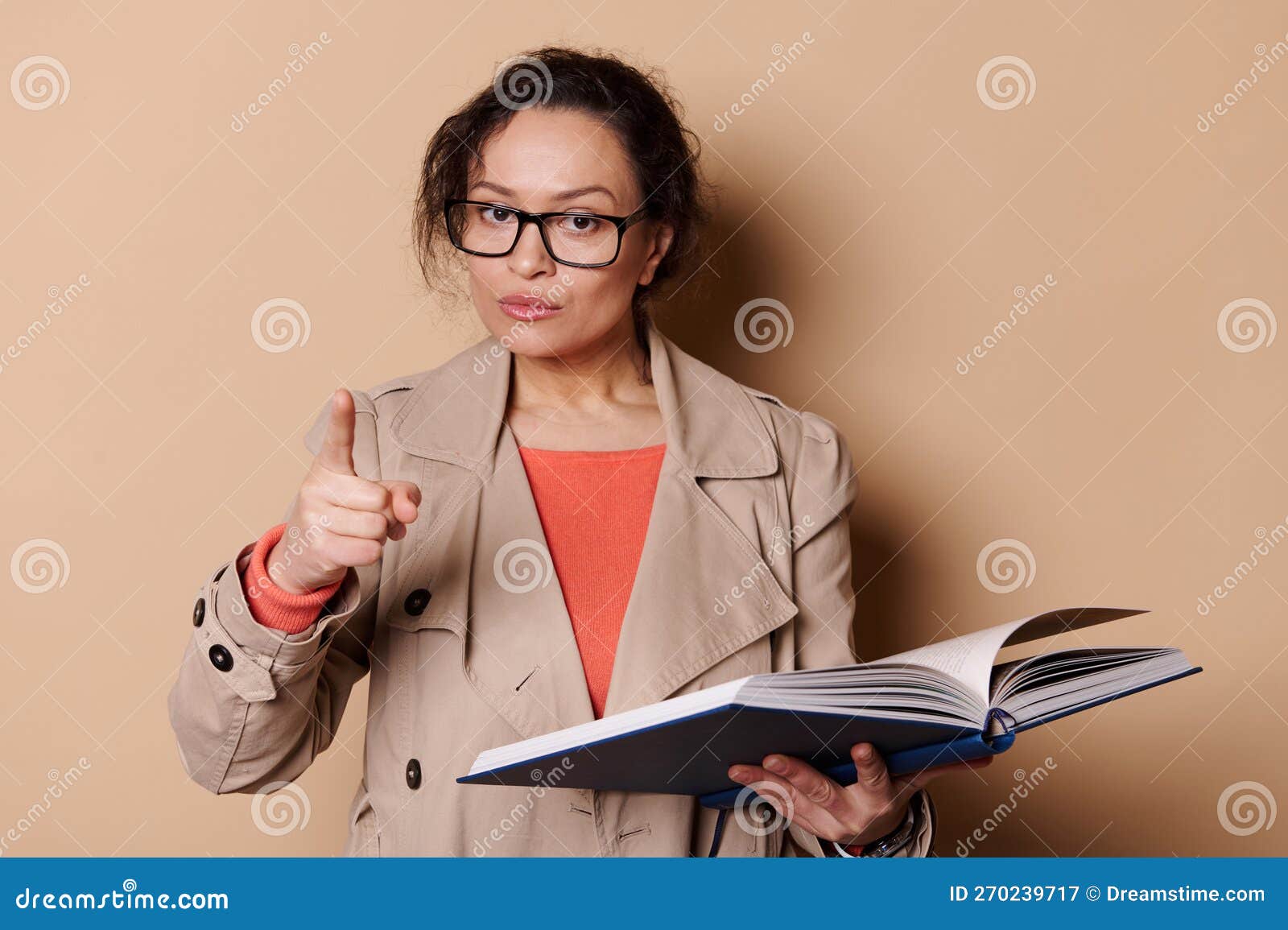Stylish woman posing with book Stock Photo by ©skat_36 172042016