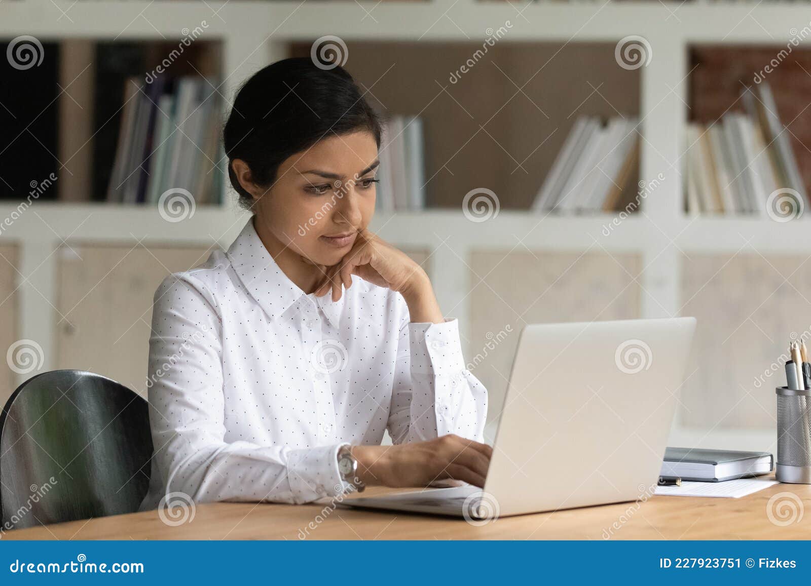 Serious Thoughtful Indian Woman Working on Laptop Stock Image - Image ...