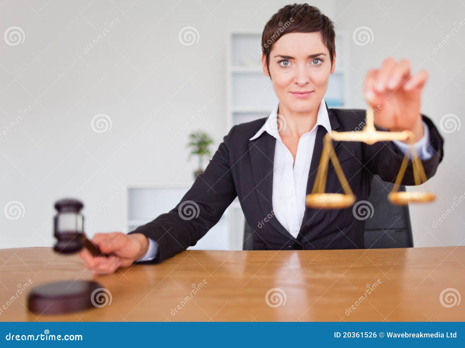 Serious Woman with a Gavel and the Justice Scale Stock Photo Image of