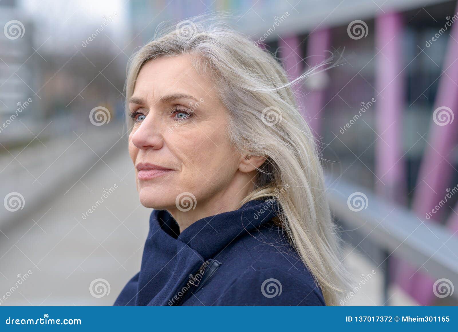 serious woman looking intently to the side