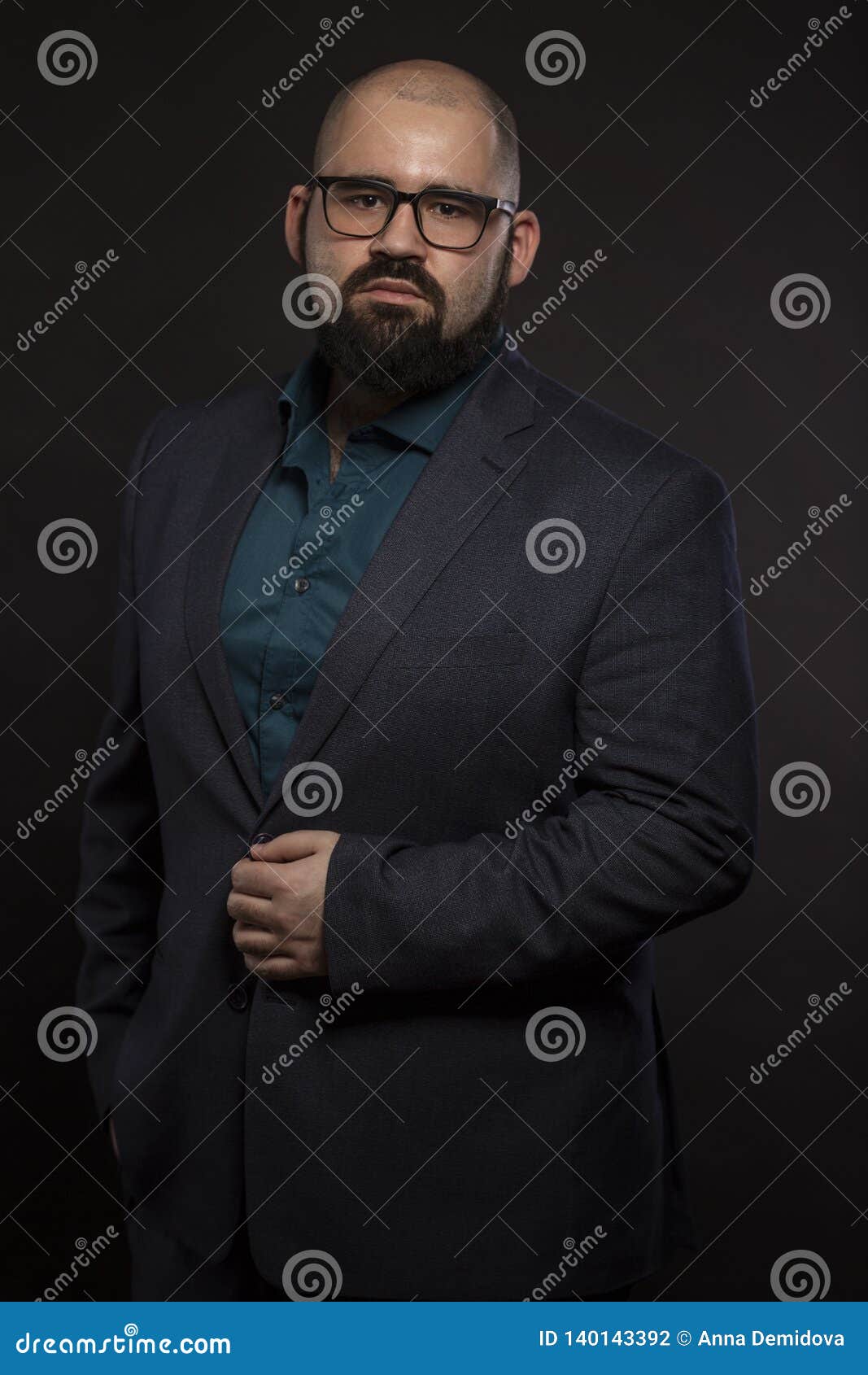 Serious Young Bald Man in Glasses with a Beard, Black Background Stock  Photo - Image of face, eyeglasses: 140143392