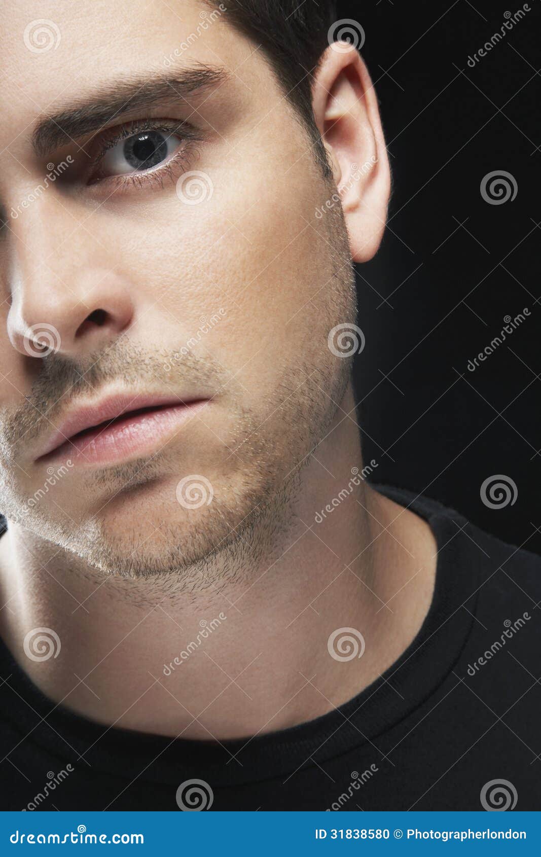 Serious Young Man stock photo. Image of background, black - 31838580