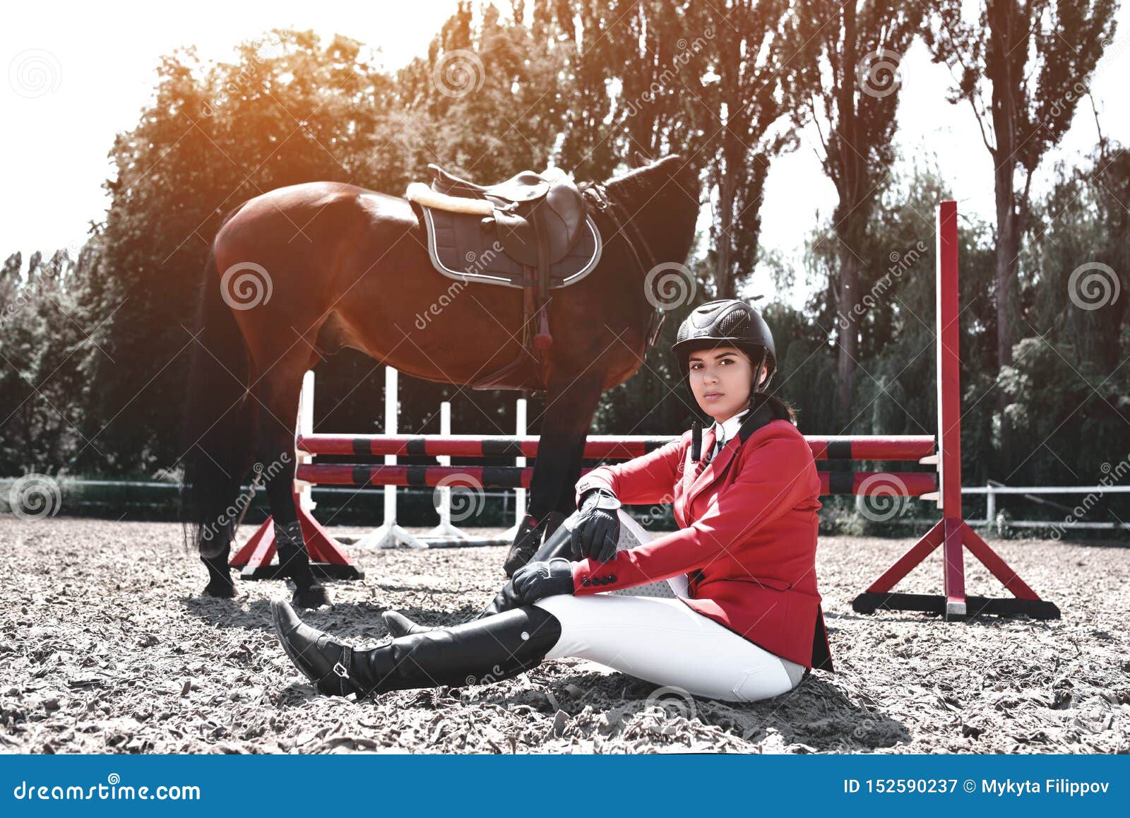 Serious Young Rider Girl And Her Horse Posing After Training She Loves