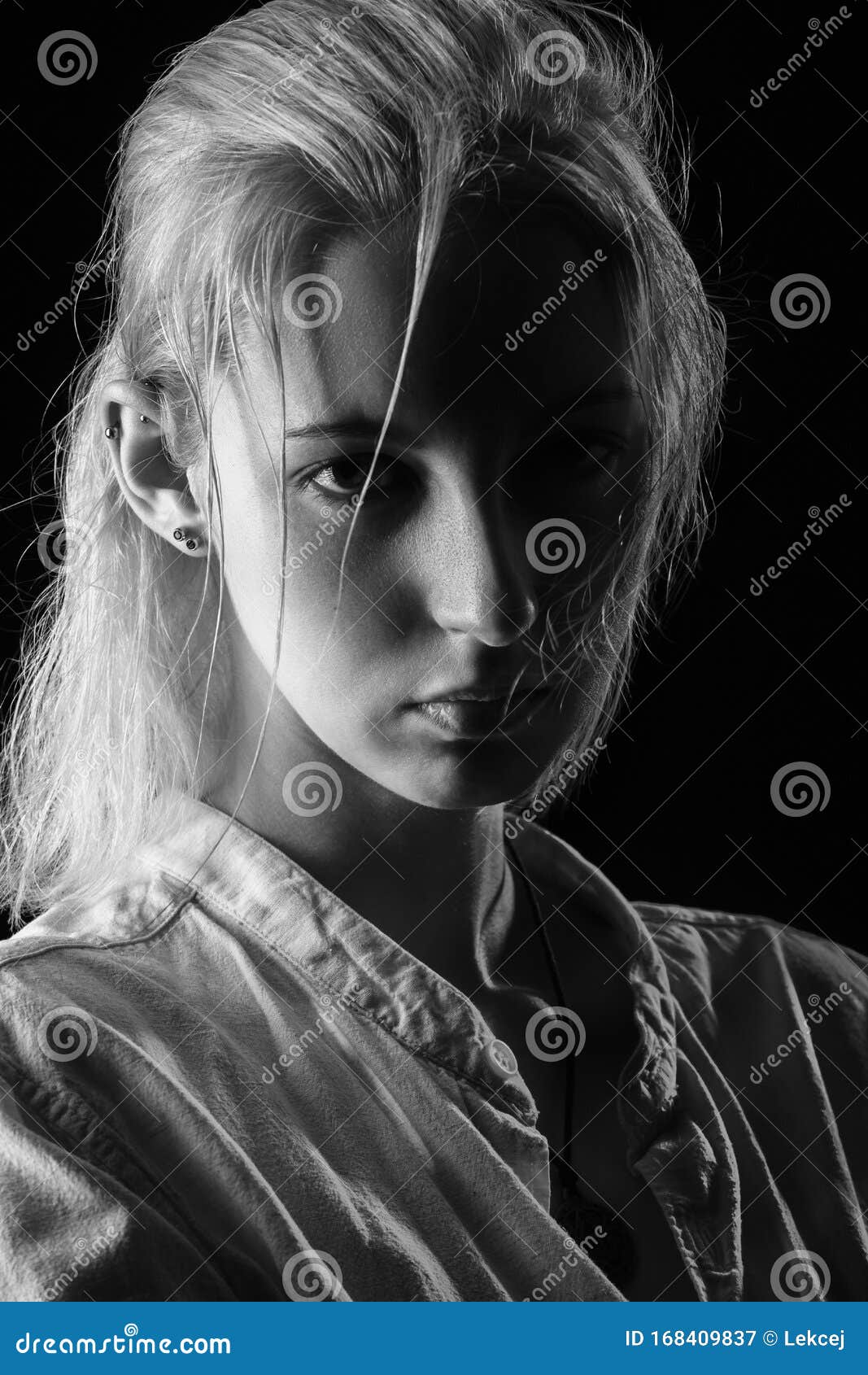 Serious young woman stock image. Image of background - 168409837