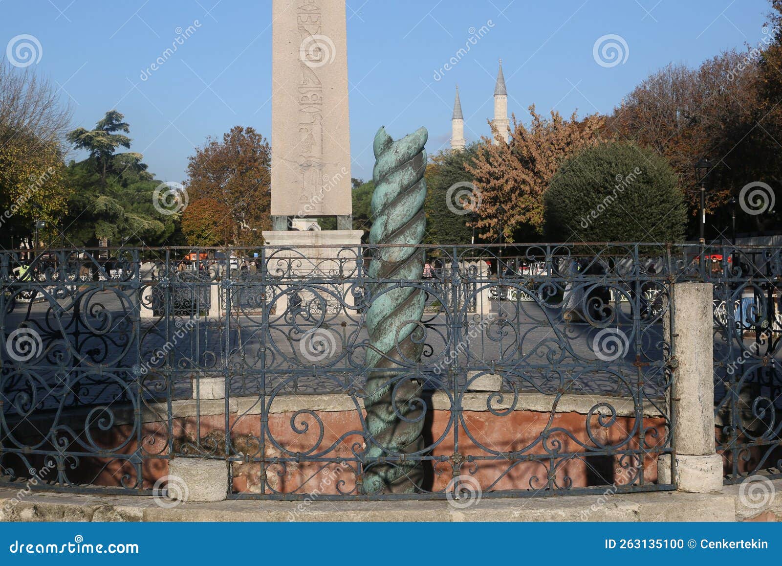 serpentine column behind obelisk