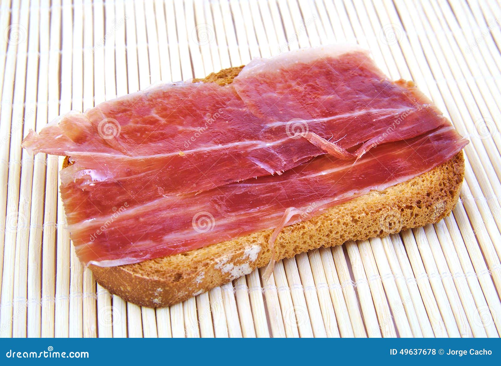 Serrano Ham on Toasted Bread. Jabugo. Spanish Tapa. Stock Photo Image