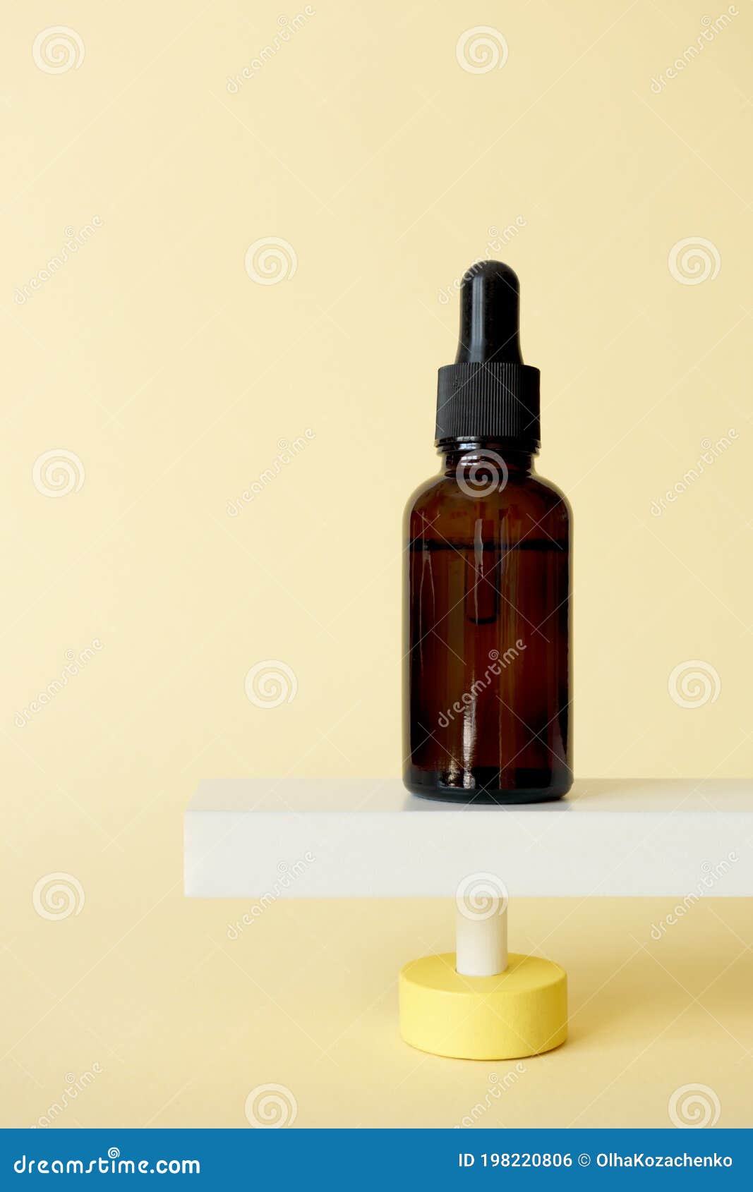 serum facial moisturizer bottle standing on abstract pedestal on pastel yellow background with copy space, front view. blank brown