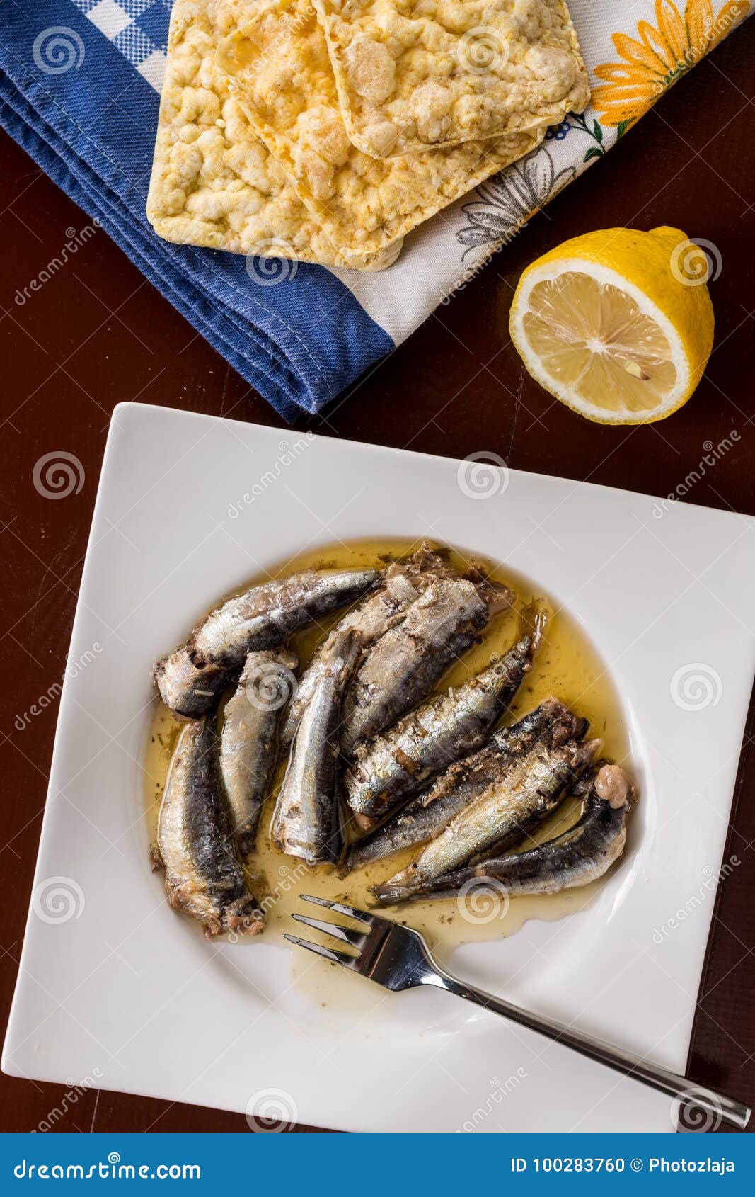 Served Marinated Sardines in the Oil with Lemon and Corn Bread Stock
