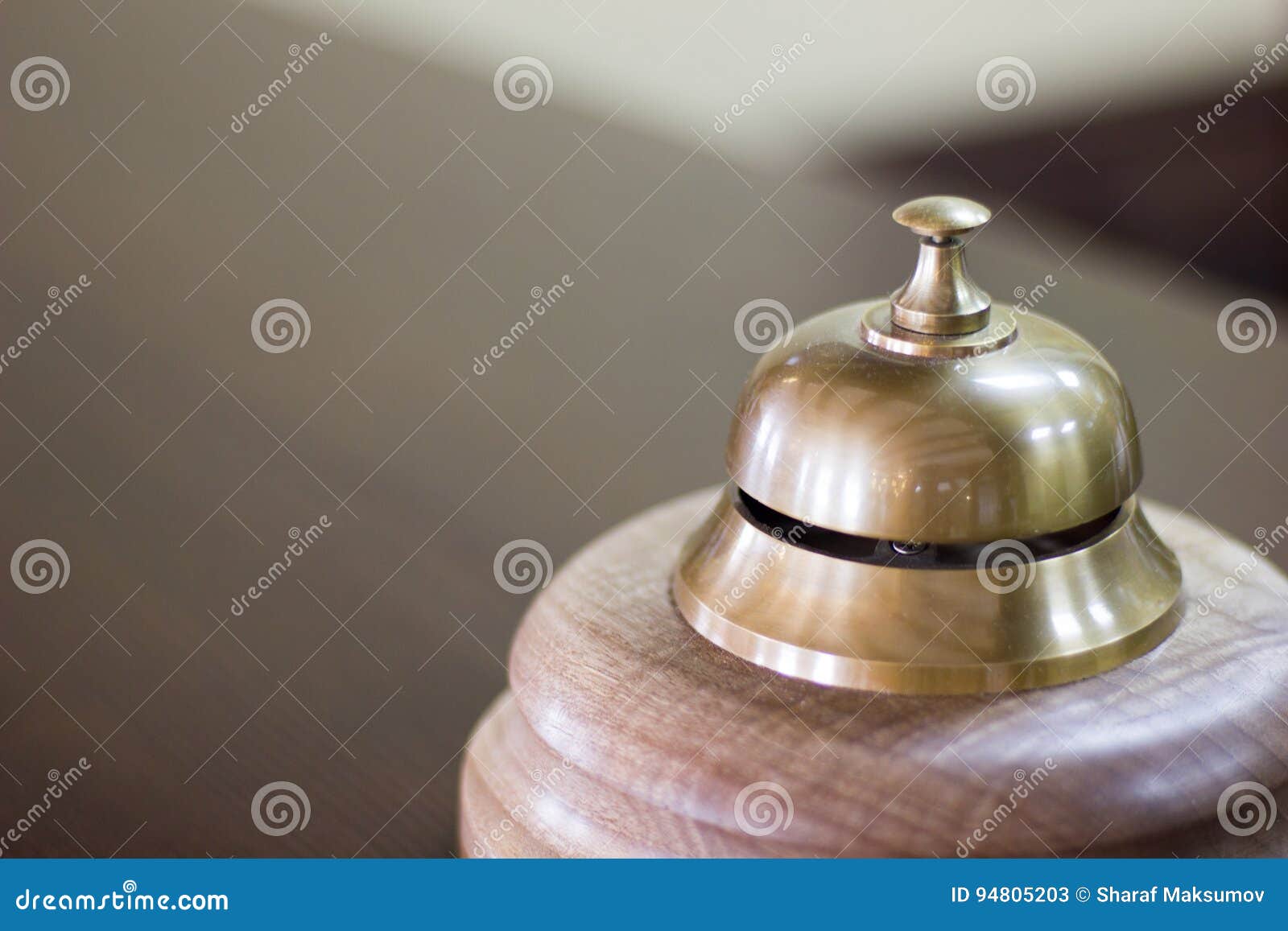 Service Bell in a Hotel Reception for Concierge Alarm on Desk. Stock