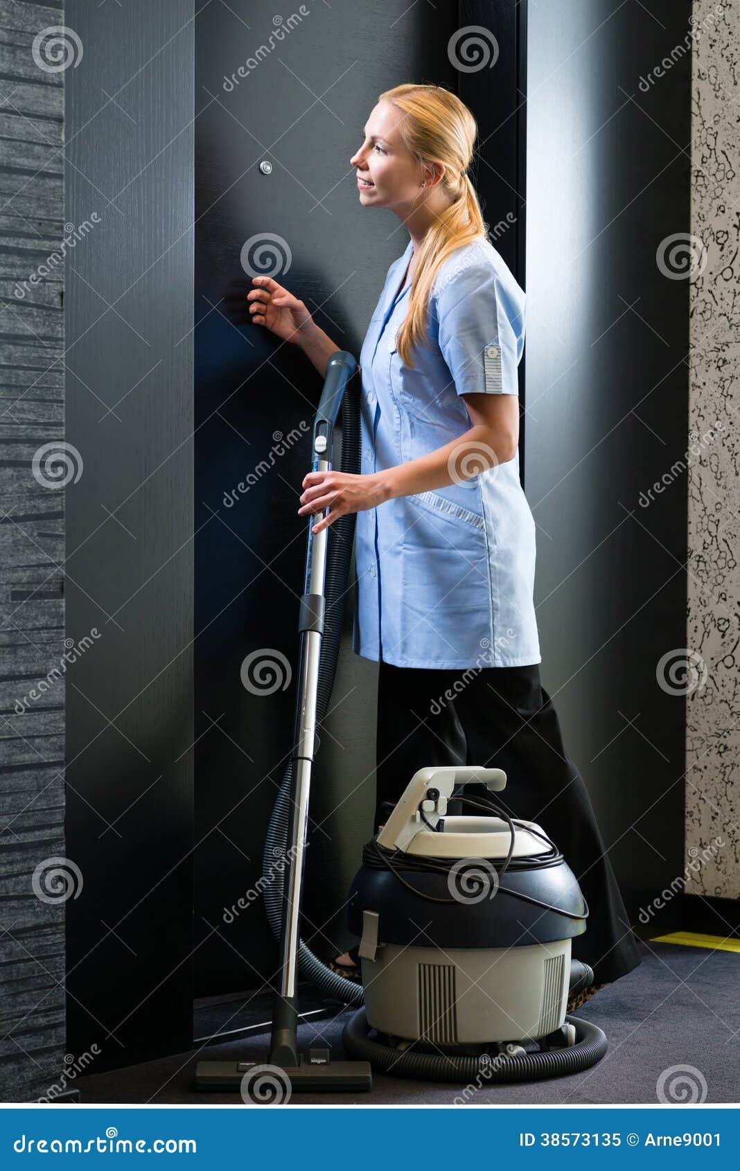 Service In Hotel, Maid With Vacuum Cleaner Royalty Free Stock Photo