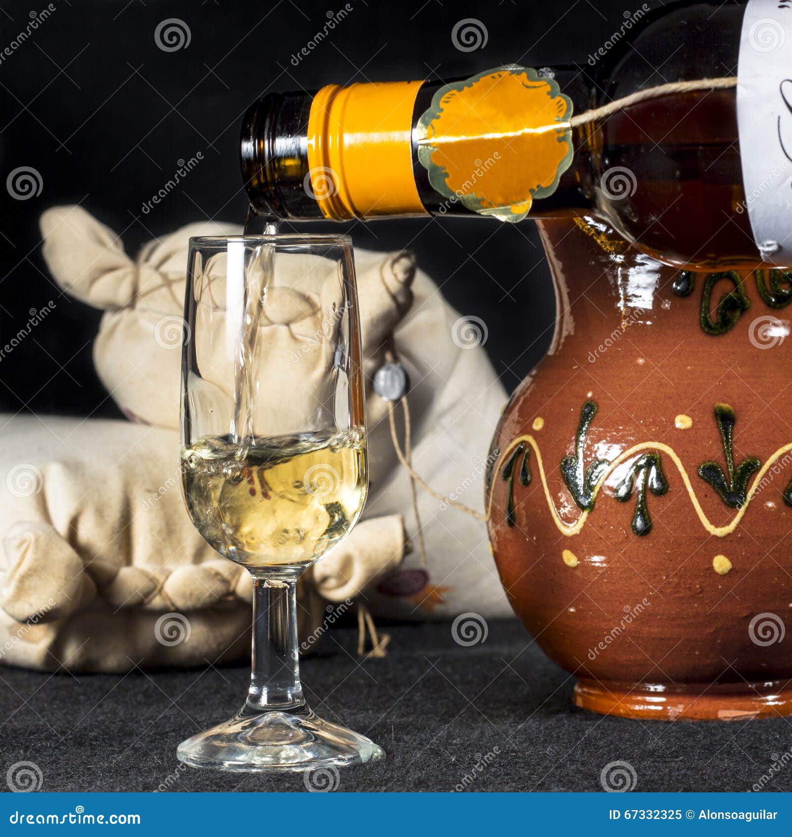 serving a cup of fino sherry, manzanilla wine