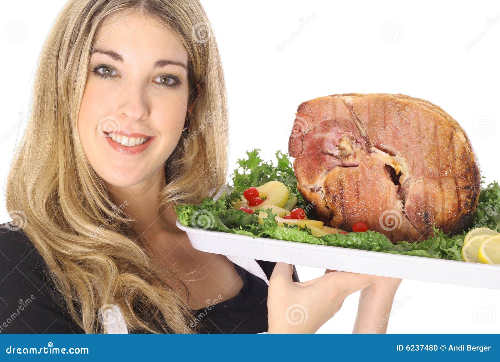Serving a honey baked ham stock photo. Image of female 6237480