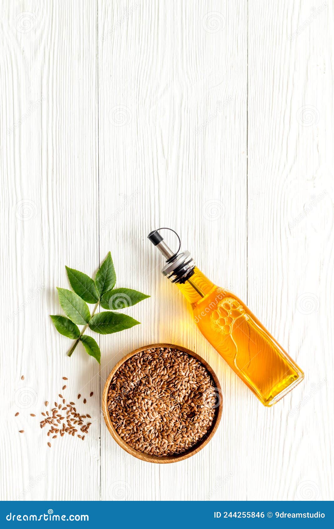 Sesame Oil in Bottle with Ingredient Sesame Seeds Stock Photo Image