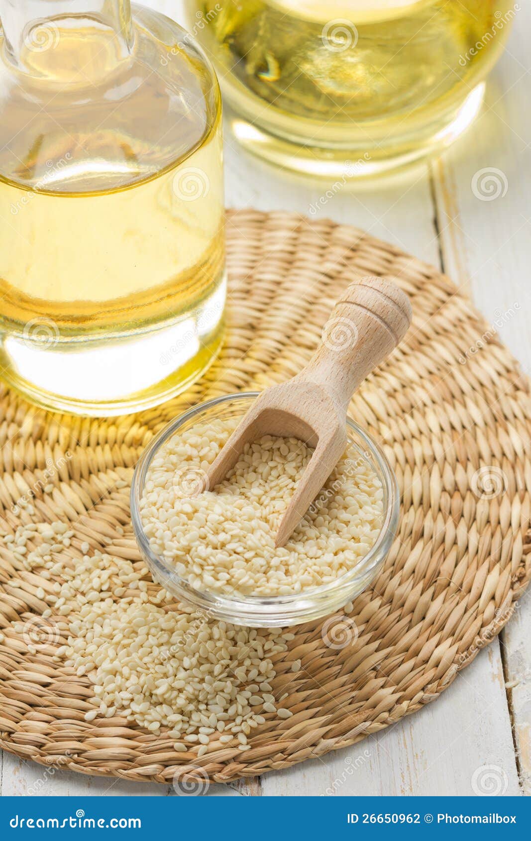 Sesame seeds and oil stock photo. Image of organic, brown 26650962