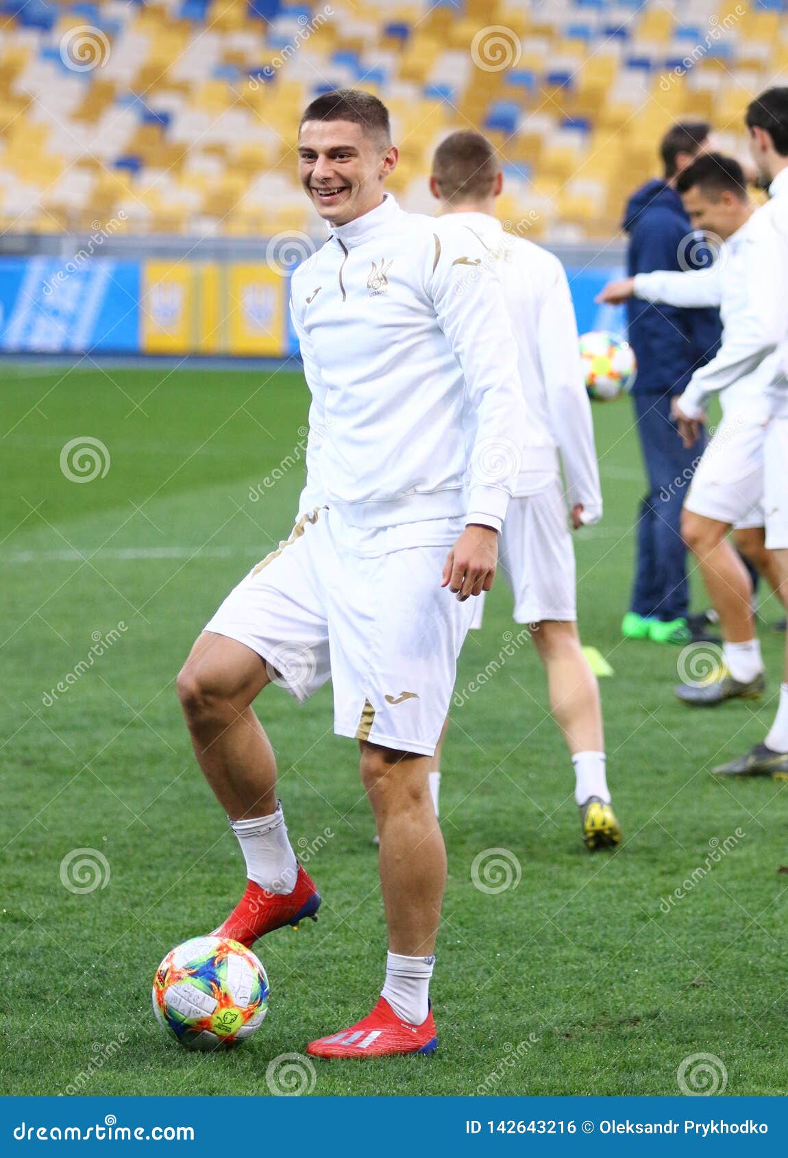 Training session of Ukraine National Football Team in Kyiv, Ukraine. KYIV, UKRAINE - MARCH 18, 2019: Player of Ukraine National Football Team Vitaliy Mykolenko in action during the Open Training Session at NSC Olimpiyskyi stadium in Kyiv, Ukraine