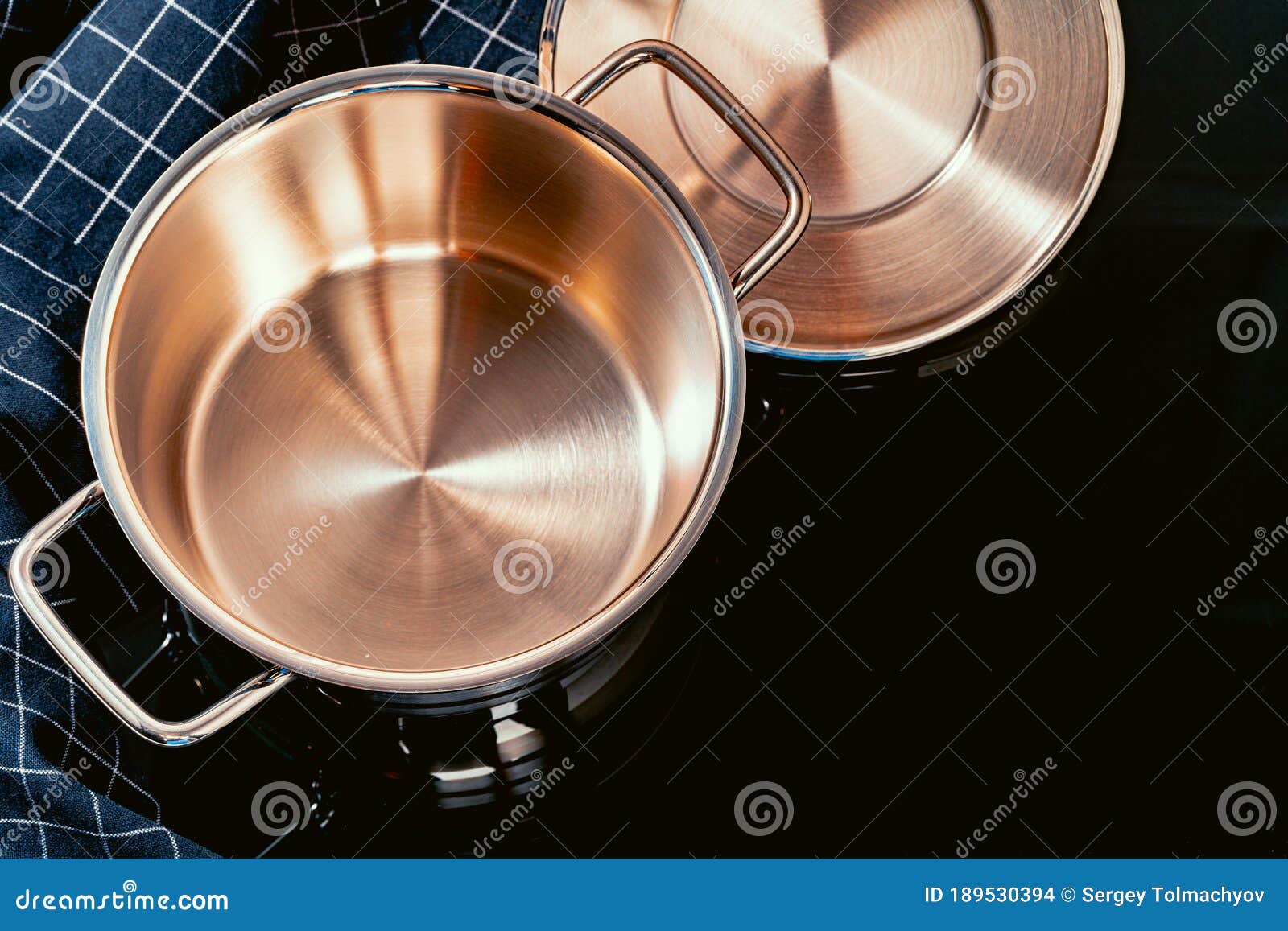 Set of Aluminum Pans on Black Surface Close Up Stock Photo Image of