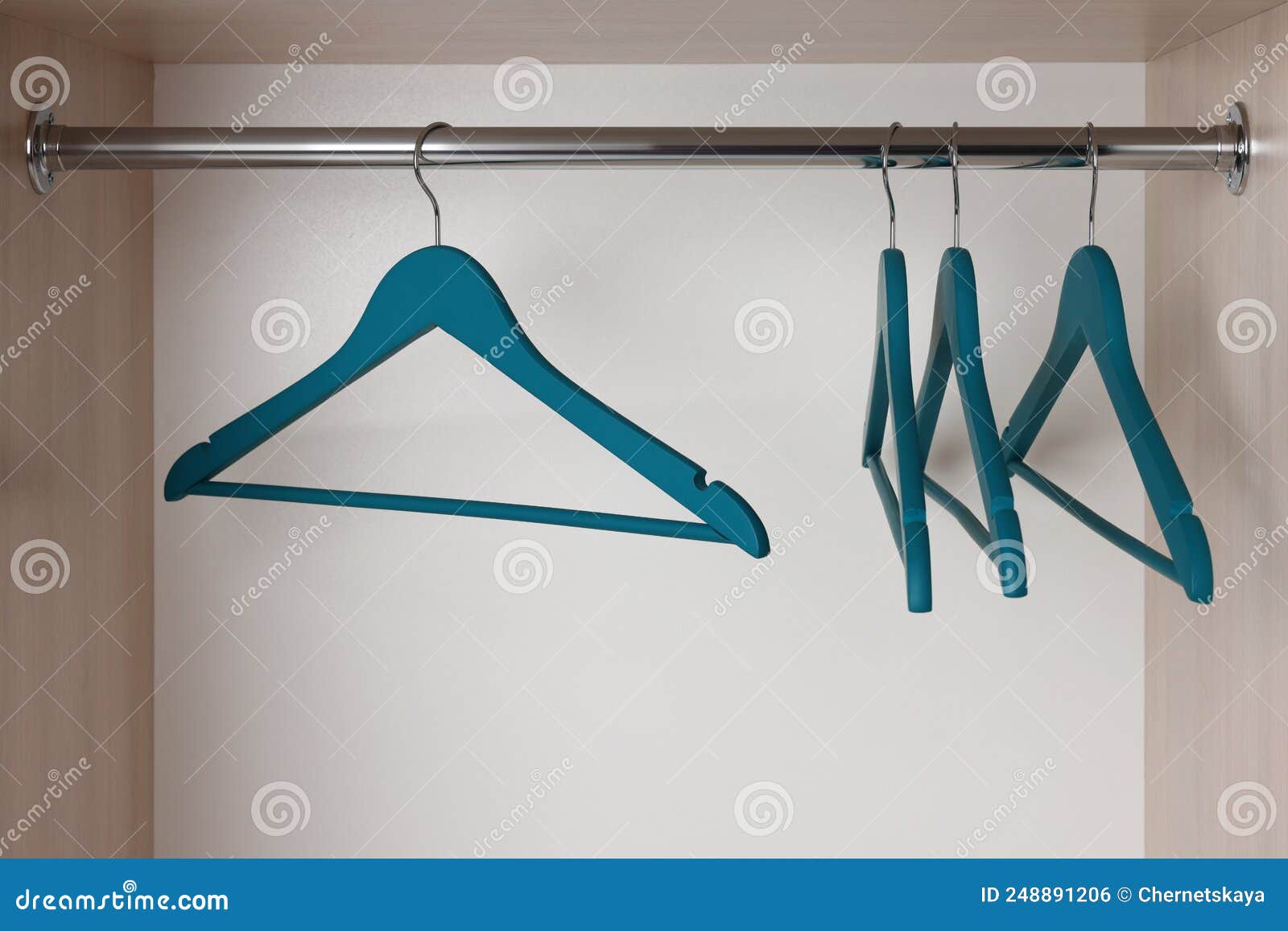 Set of Blue Clothes Hangers on Wardrobe Rail Stock Photo Image of