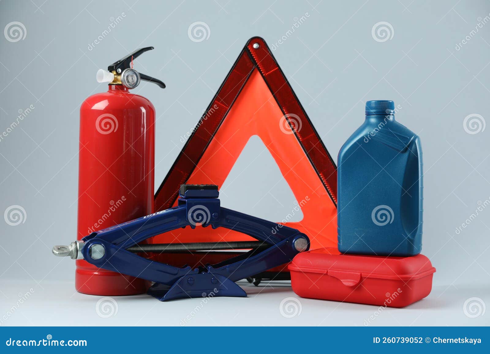 Set of Car Safety Equipment on Light Grey Background Stock Photo
