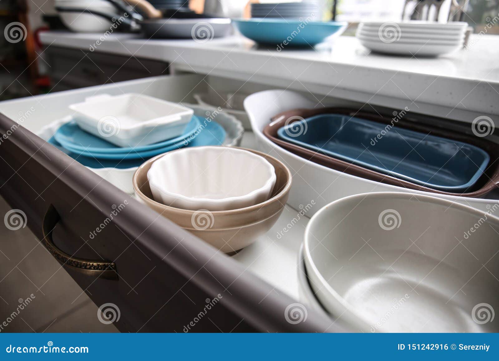 Set of Clean Tableware in Kitchen Drawer Stock Photo Image of kitchen