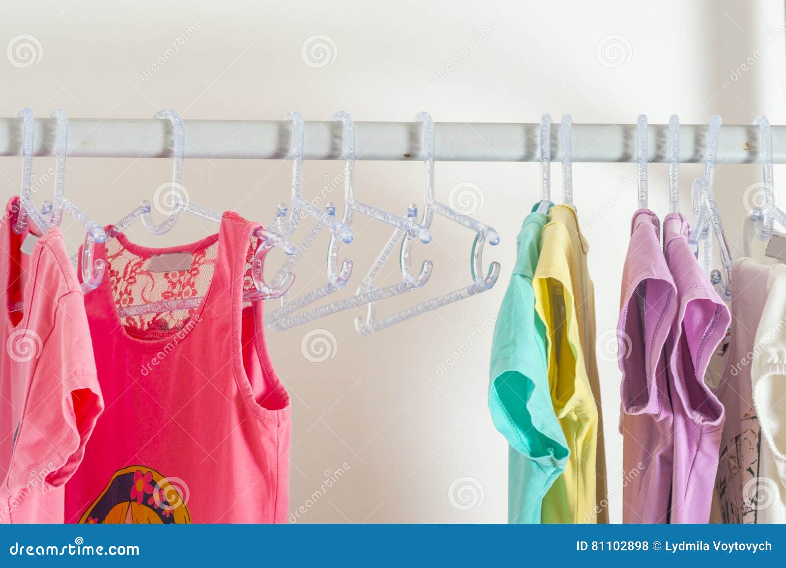 Set of Clothes for Kids on Hangers. Shopping Stock Photo Image of