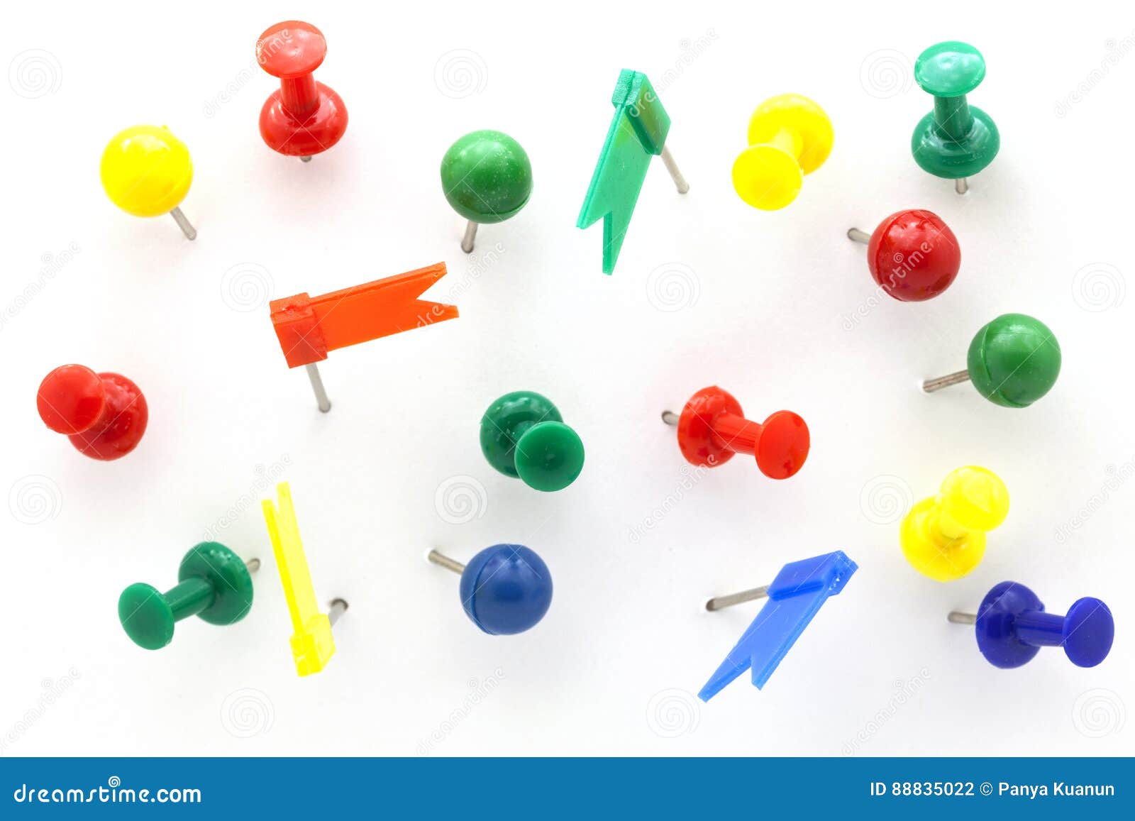 set of colorful color push pins top view  on white background.