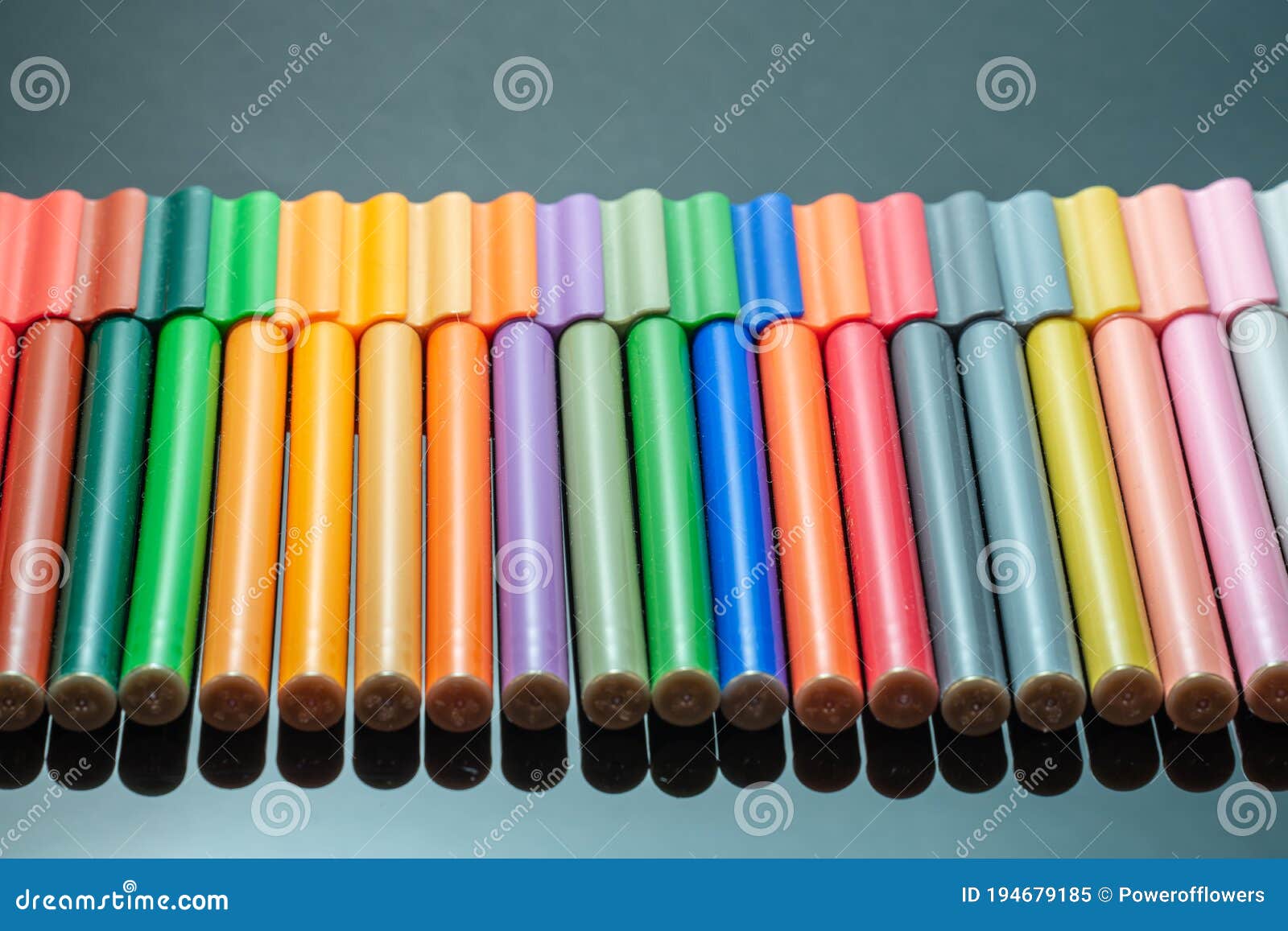 A Set of Colorful Markers that Lie on a Mirror Surface Stock Image