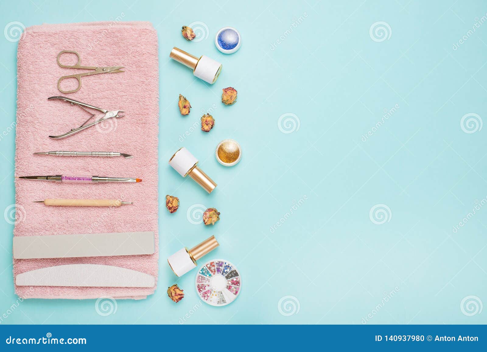 A Set of Cosmetic Tools for Manicure and Pedicure on a Blue Background ...