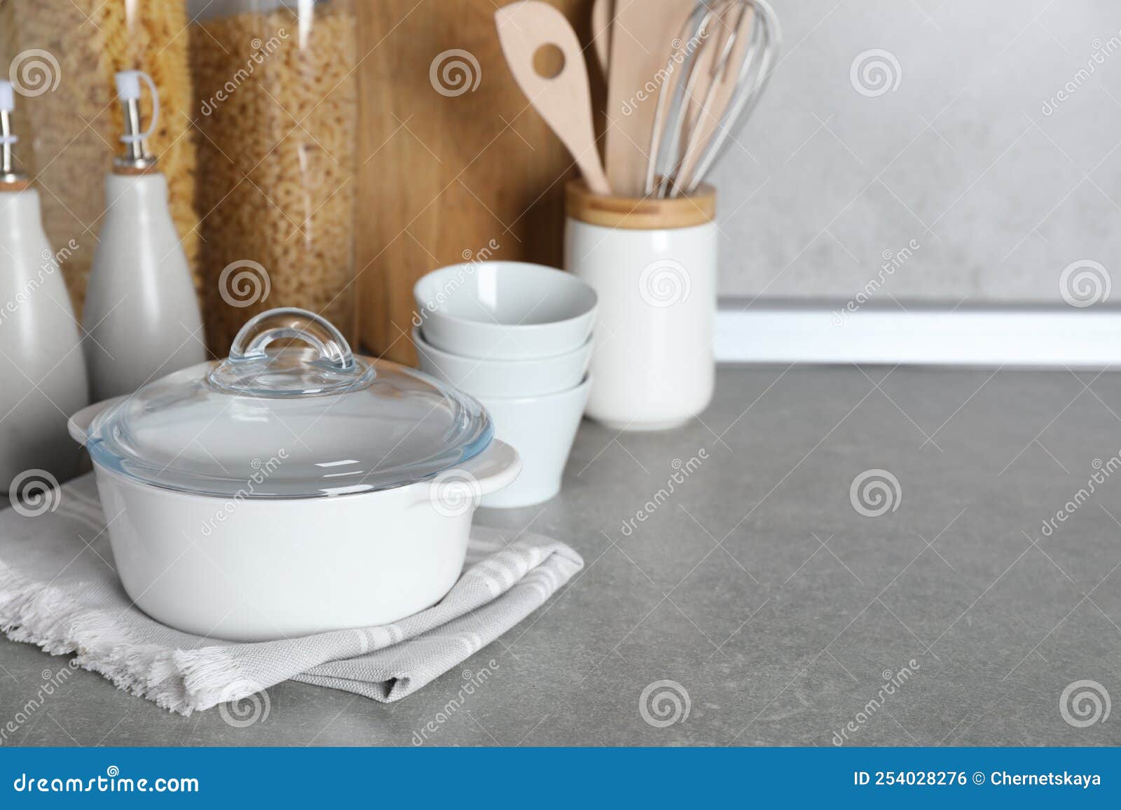 Set of Different Cooking Utensils on Grey Countertop in Kitchen. Space