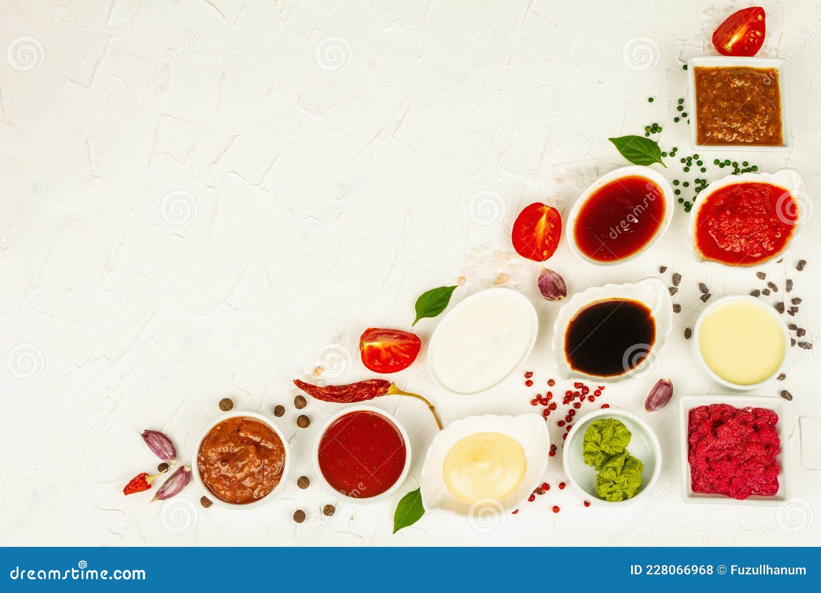 set of different sauces - ketchup, mayonnaise, barbecue, soy, chutney, wasabi, adjika, horseradish