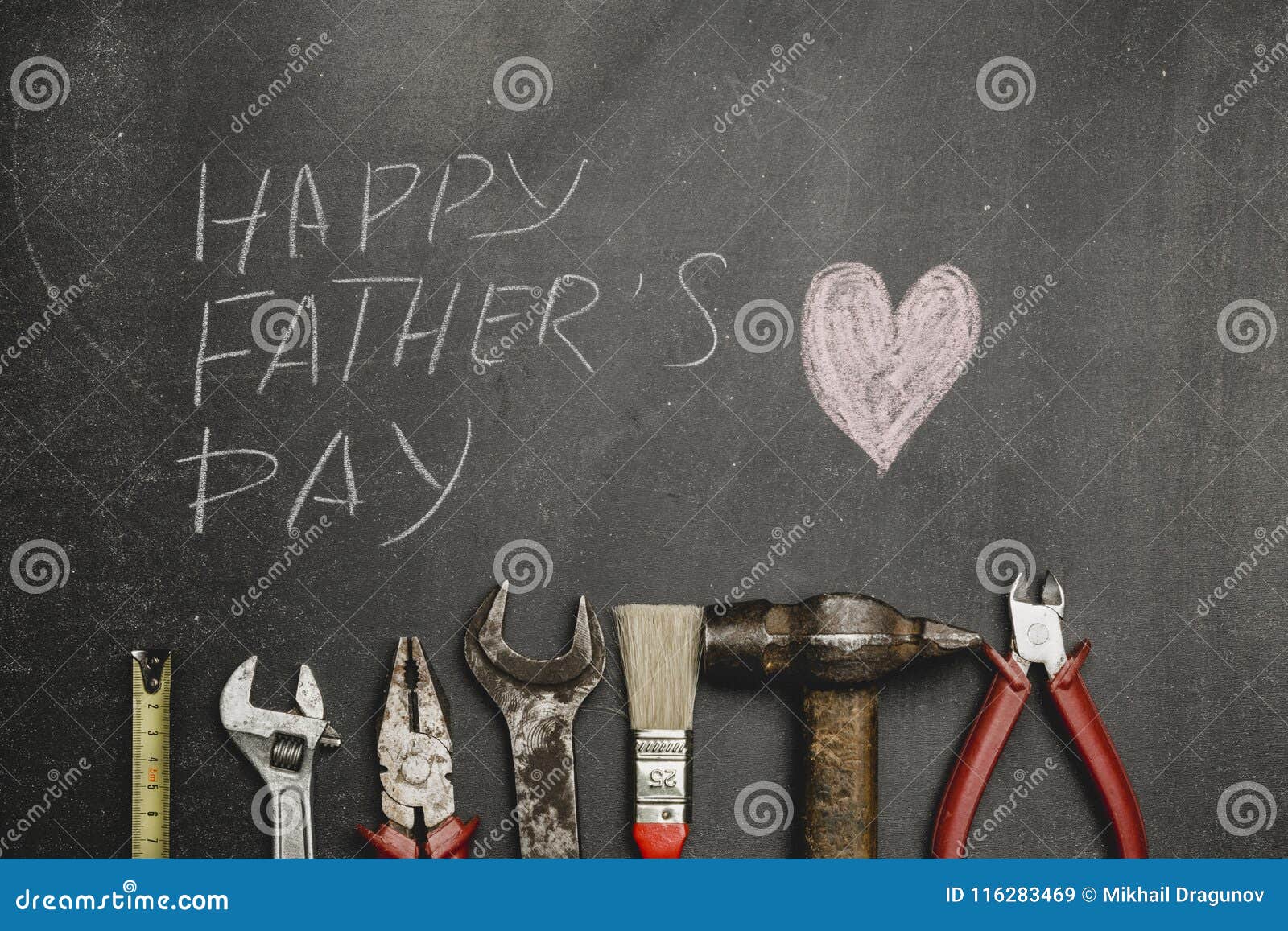 set of different tools on dark background.a concept for father& x27;s day. top view.